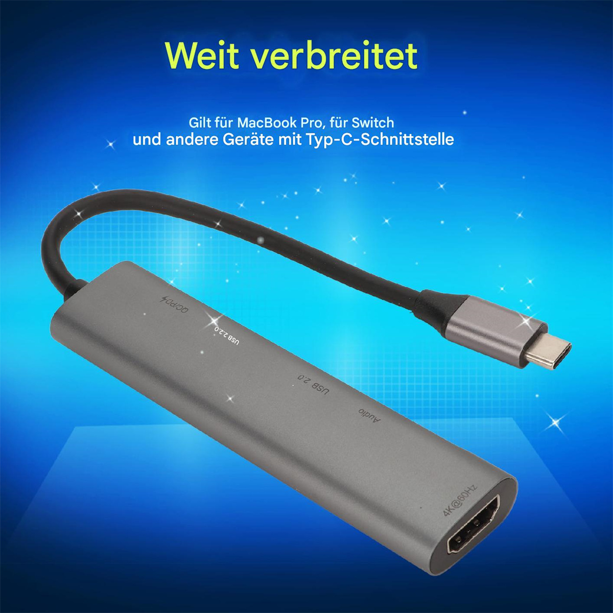 Ein grauer USB-C-Hub mit mehreren Anschlüssen und einem schwarzen Kabel.