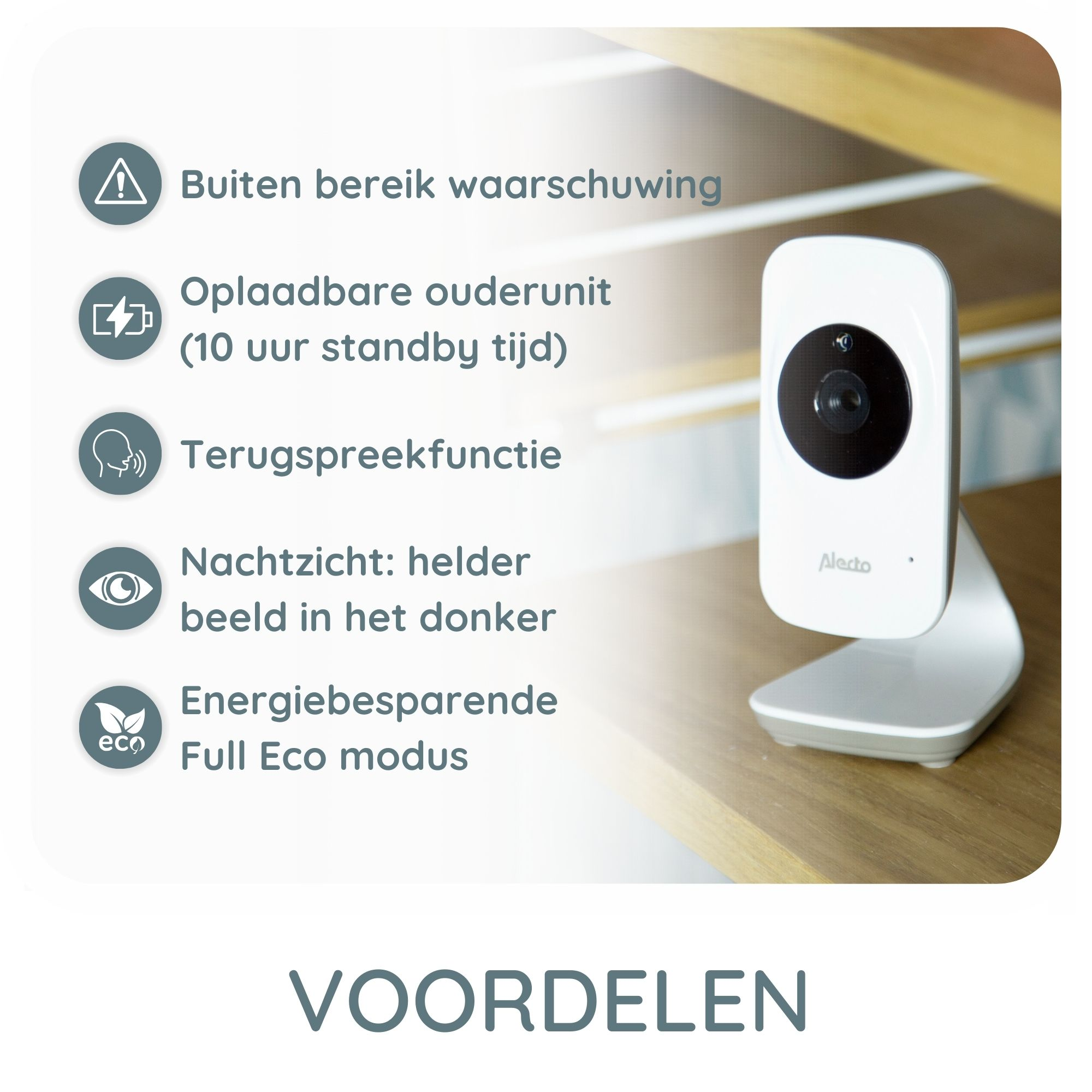 Ein weißer Babyphone mit Text und Symbolen auf einer Holzoberfläche.