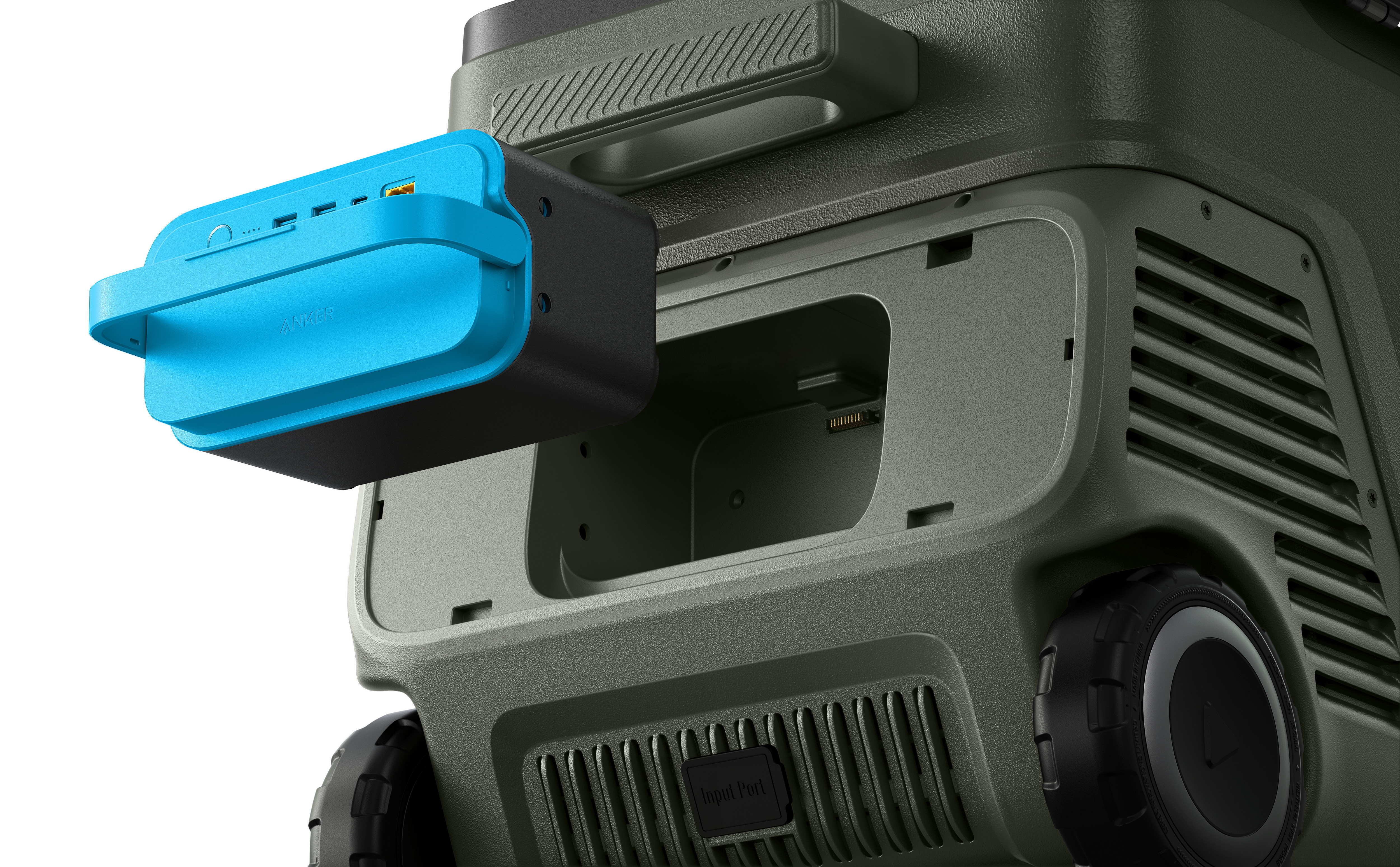 Un power bank Anker blu collegato a un dispositivo di raffreddamento verde scuro.