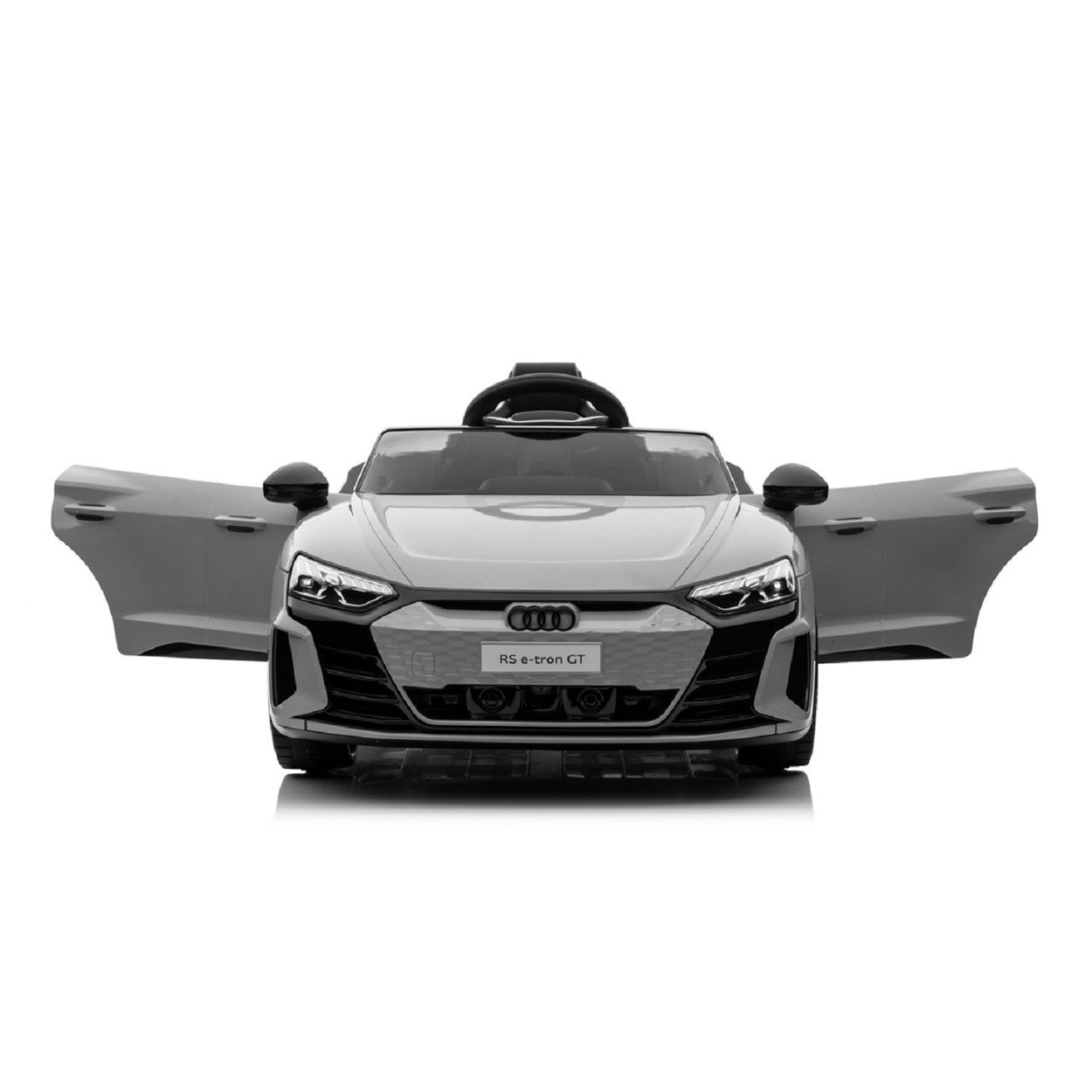 Ein grau-weißes Spielzeugauto mit geöffneten Türen, isoliert auf weißem Hintergrund.