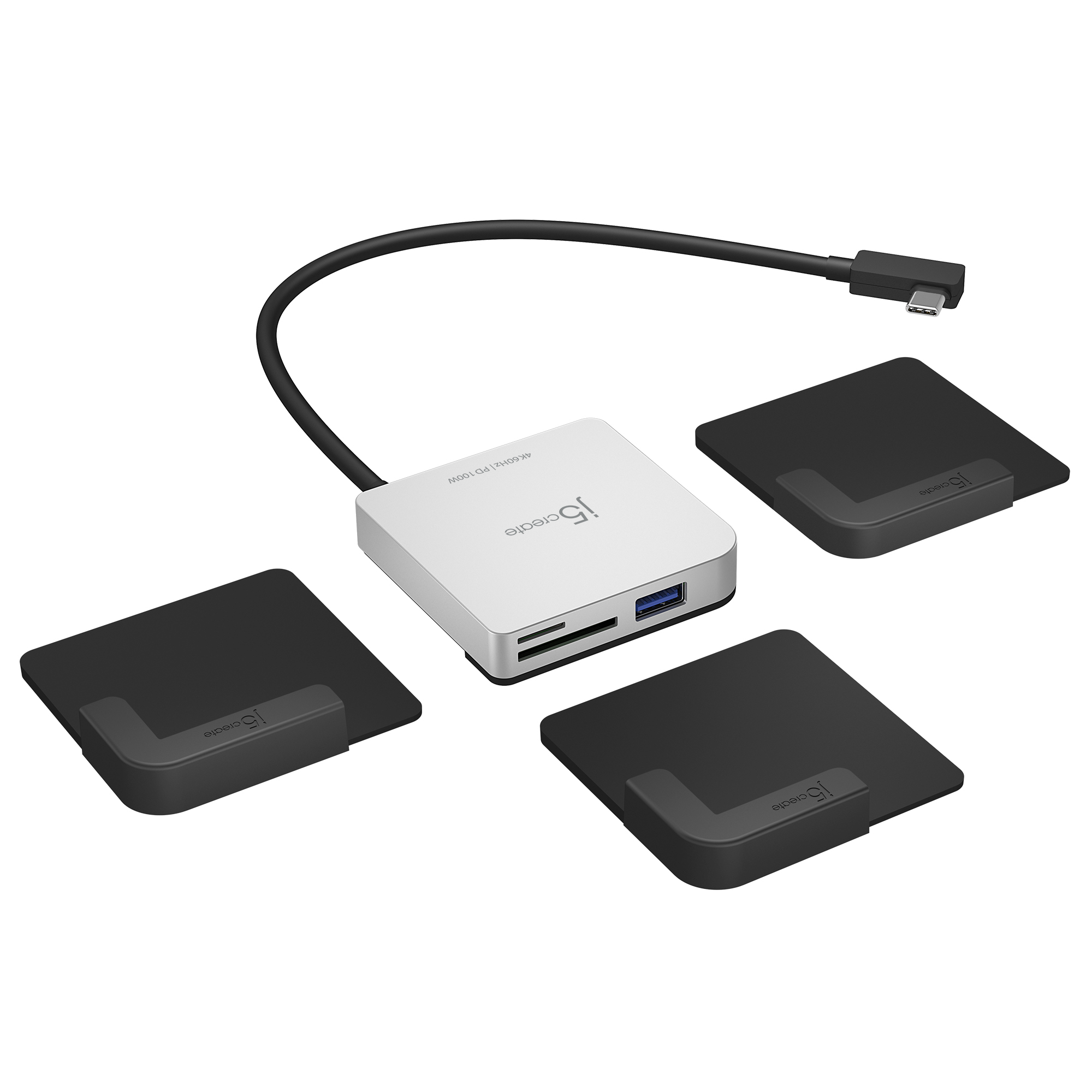 Concentrador USB-C plateado con tres tarjeteros negros. Fondo blanco. Ranuras USB y SD.
