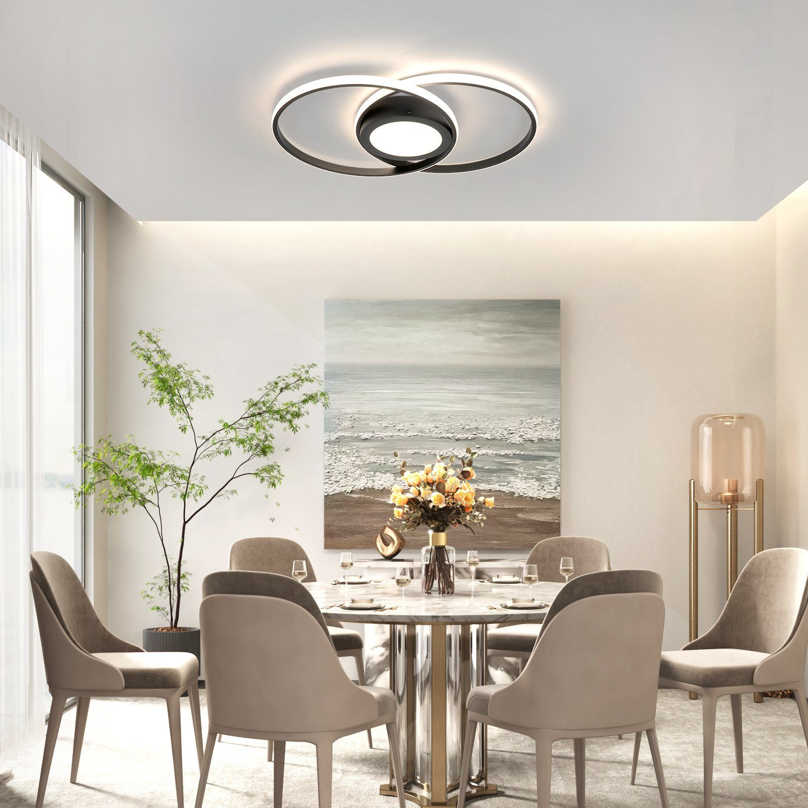 Comedor con lámpara moderna y mesa.
