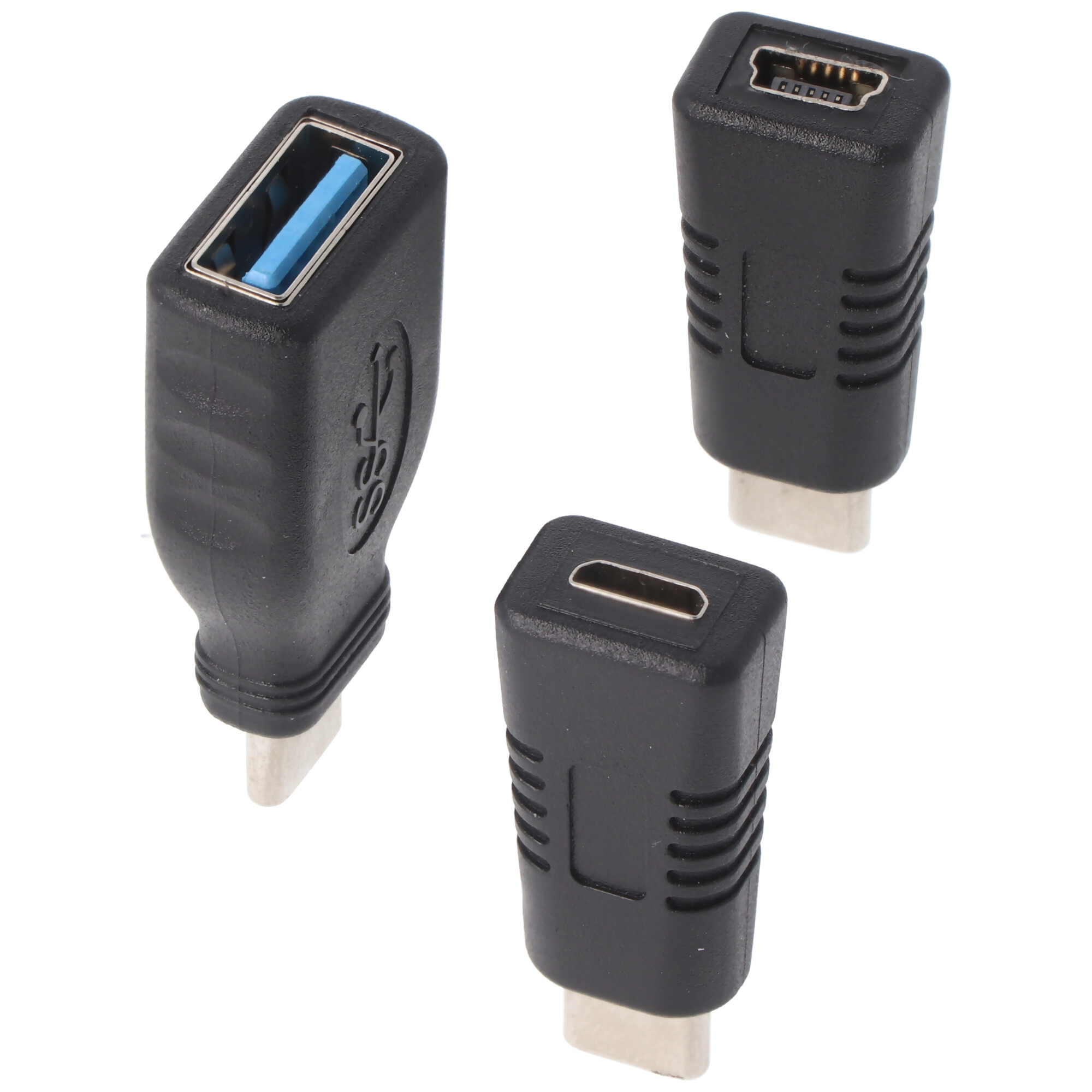 Drie zwarte USB-adapters op een witte achtergrond.