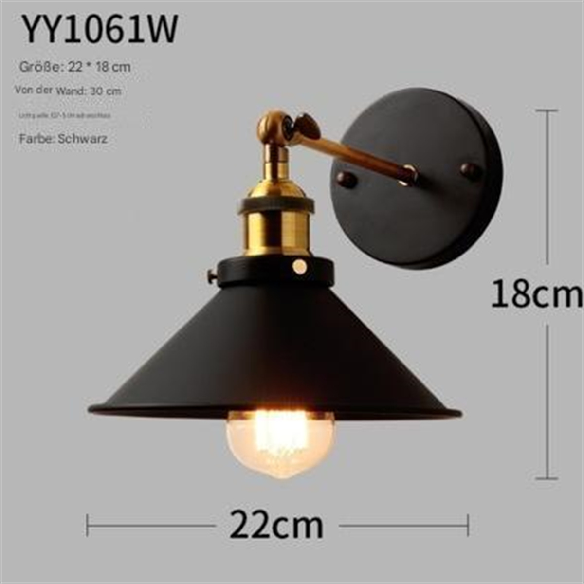 Eine schwarze Wandleuchte mit goldenem Arm und beleuchteter Glühbirne.