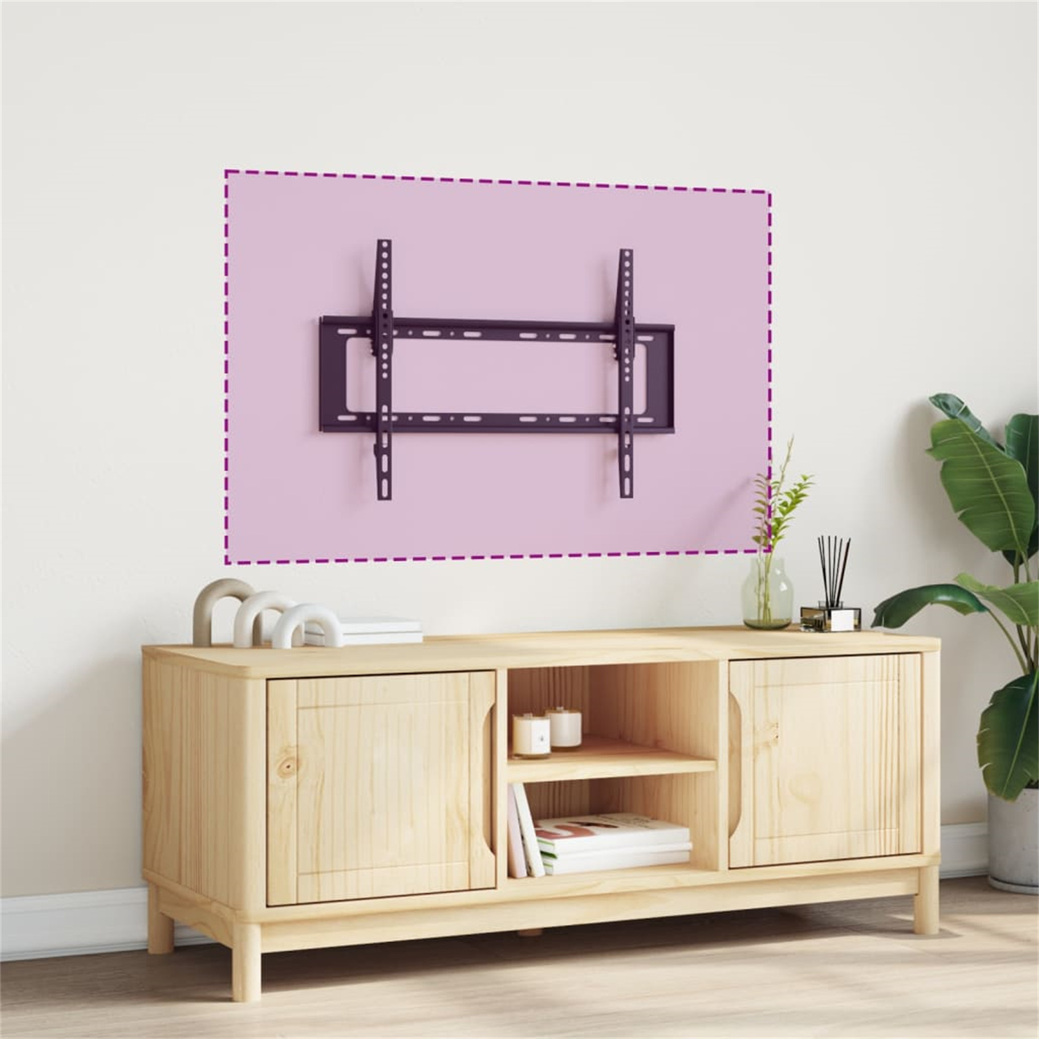 Eine TV-Halterung ist an einer rosa Wand über einem Holzschrank mit Pflanzen montiert.