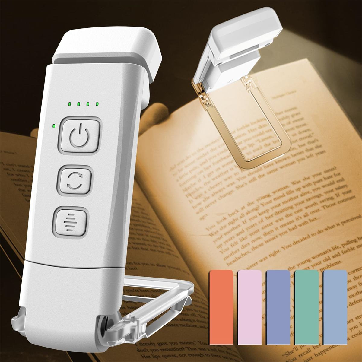 Luce da libro bianca con clip, porta di ricarica e tre pulsanti. È agganciata a un libro.