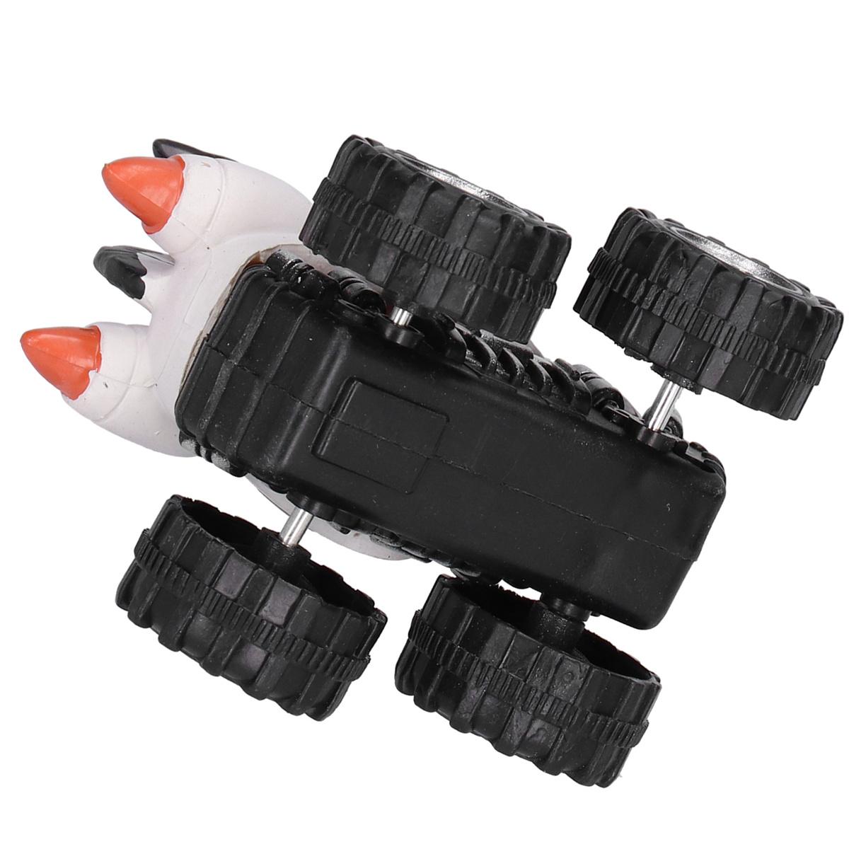 Ein Spielzeug-Monstertruck, weiß mit orangefarbenen Hörnern, schwarzen Rädern und Unterboden.
