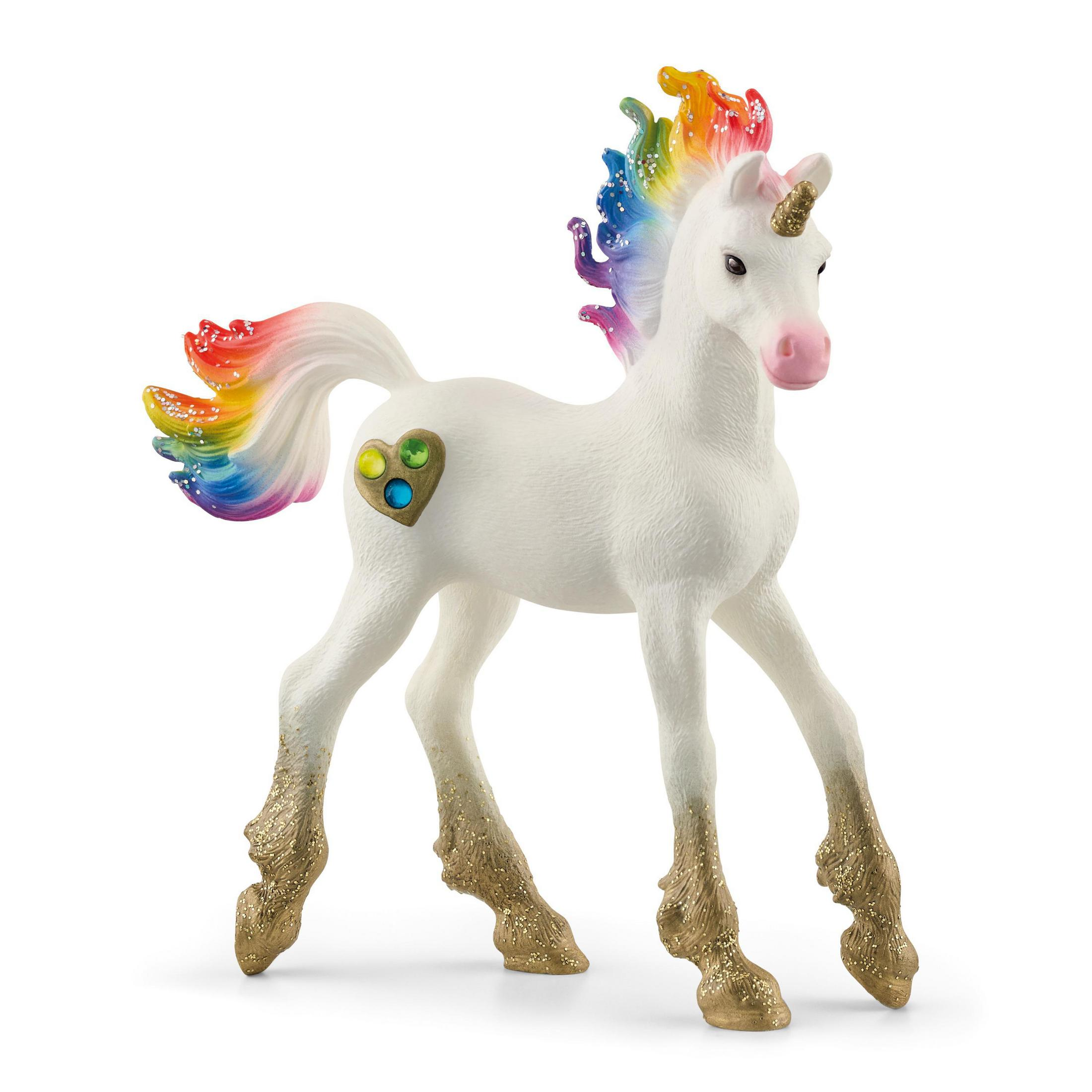 Statuina di unicorno bianco con criniera e coda arcobaleno, zoccoli dorati e un cuore.