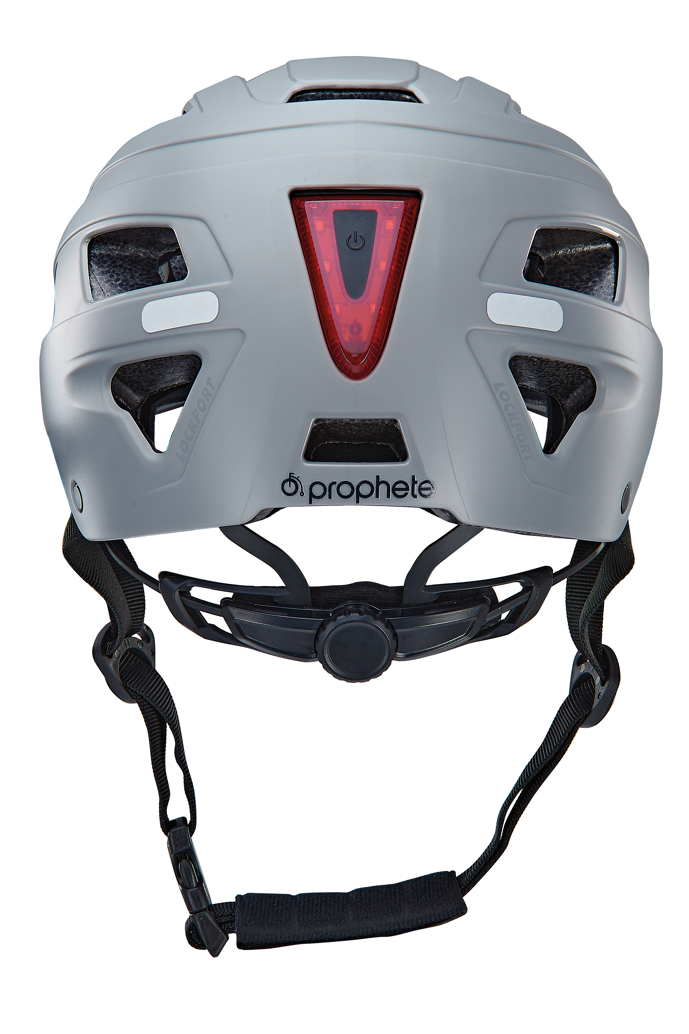 Ein grauer Fahrradhelm mit rotem Licht hinten und schwarzem Riemen.