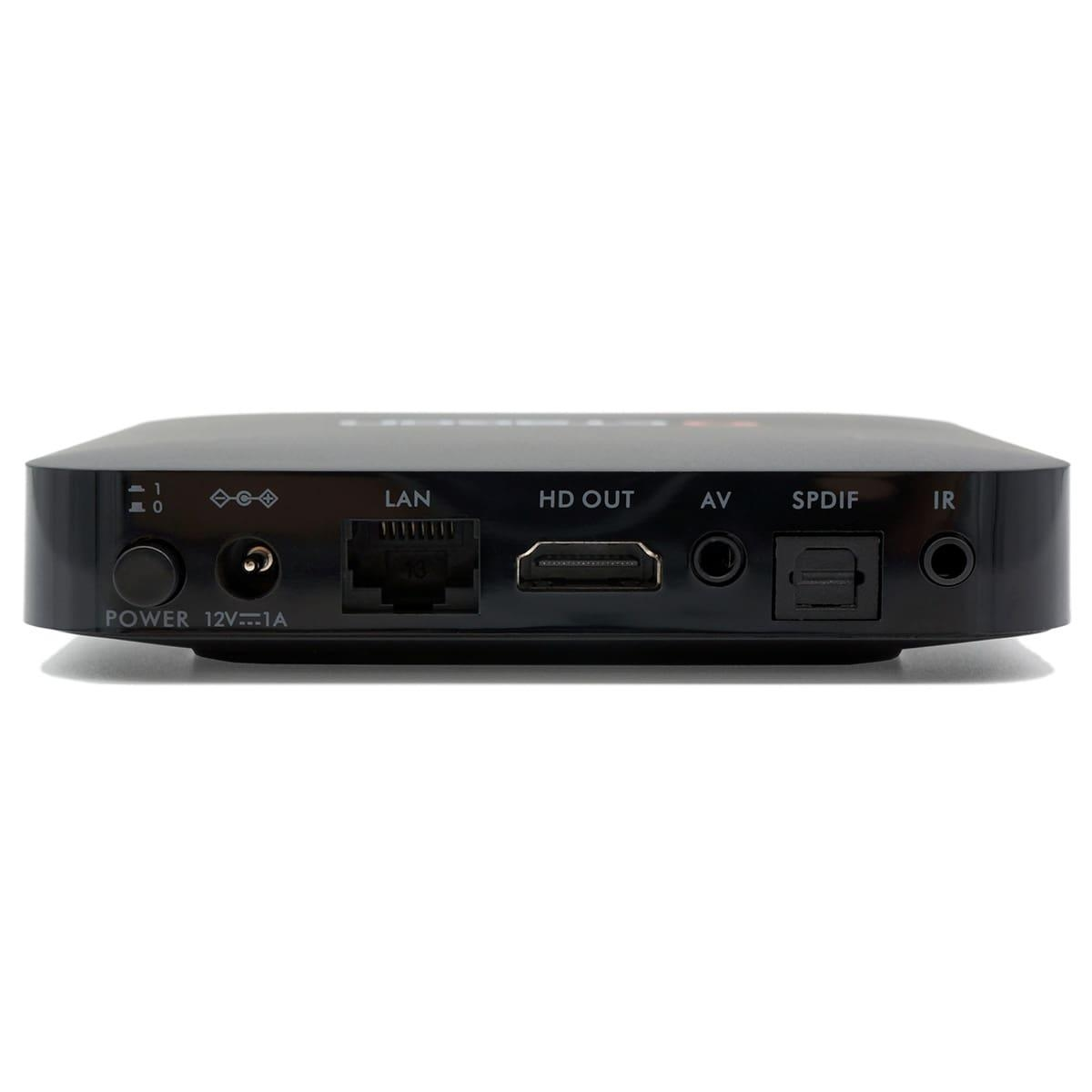Schwarze TV-Box mit mehreren Anschlüssen. Weißer Hintergrund.