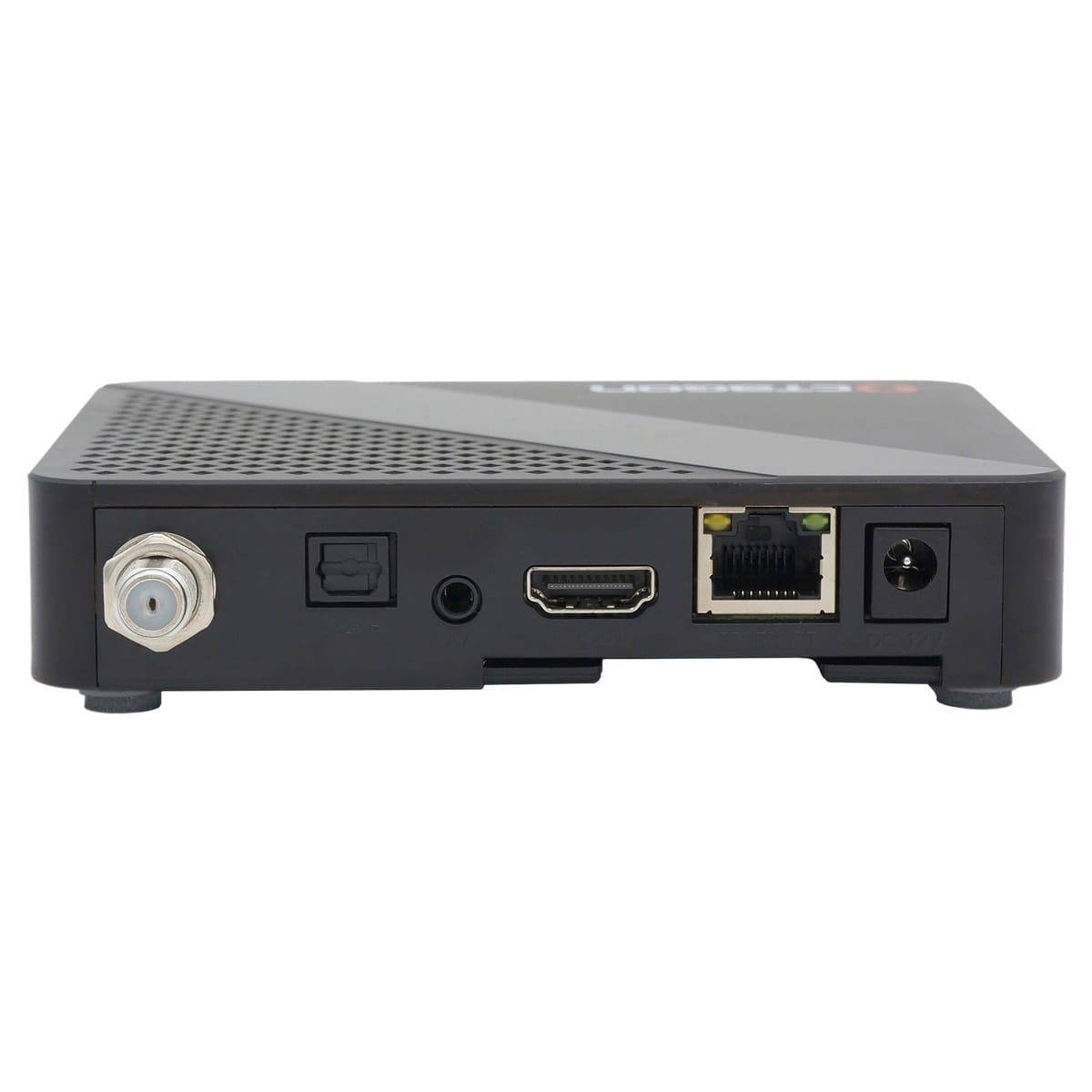 Schwarzes Gerät mit Anschlüssen. Enthält einen Koaxialanschluss, Audio, HDMI, Ethernet und Stromeingang.