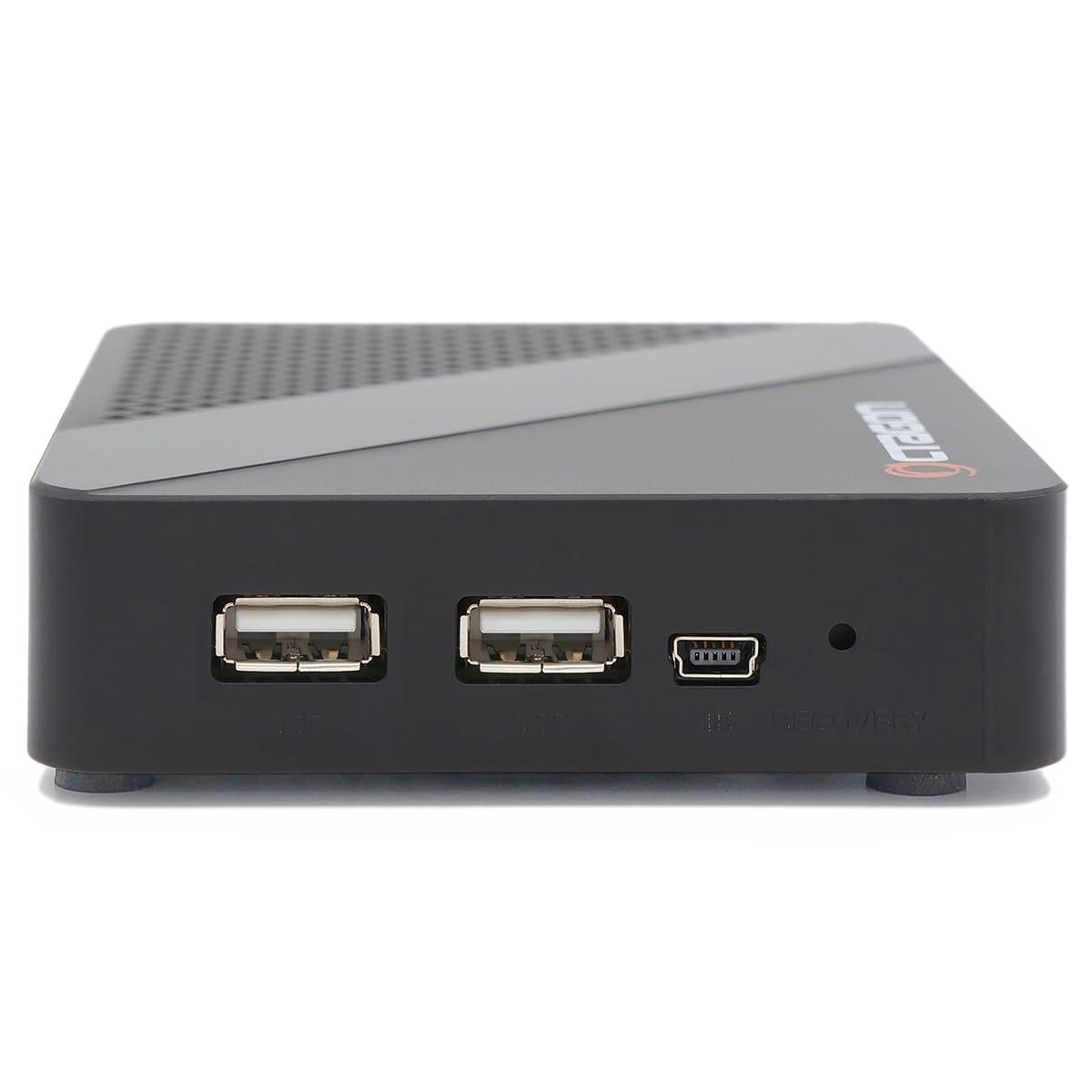 Schwarzes quadratisches Gerät mit USB-Anschlüssen, einem Micro-USB-Anschluss und dem Wort LIBERT in Weiß.