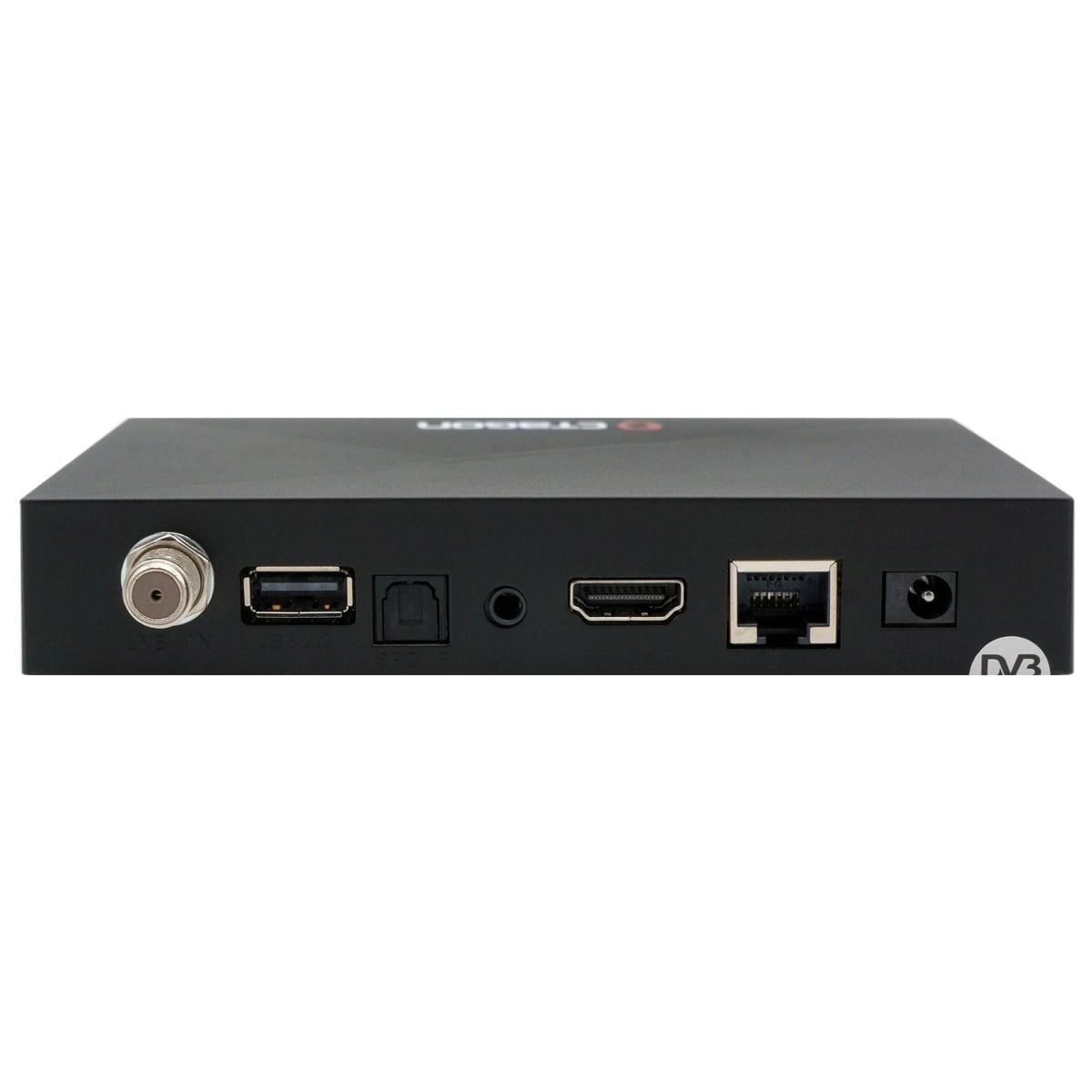 Schwarze Set-Top-Box mit verschiedenen Anschlüssen auf der Rückseite, darunter HDMI, USB und Ethernet.