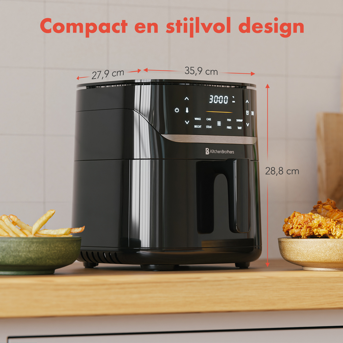 A black air fryer with dimensions noted. Fries and fried food are beside it.