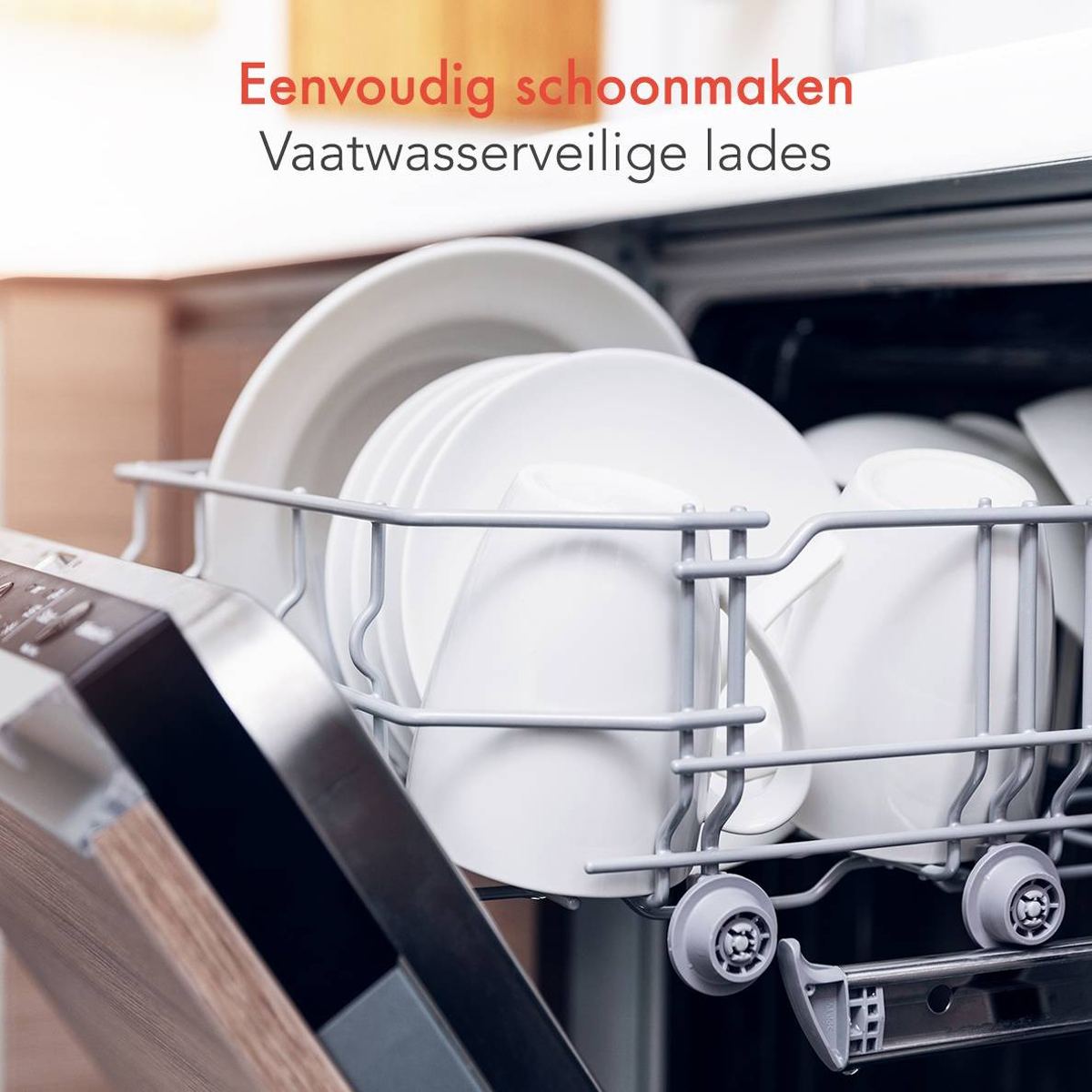 Dishwasher with dishes inside. Plates, cups, and other items are arranged on racks.