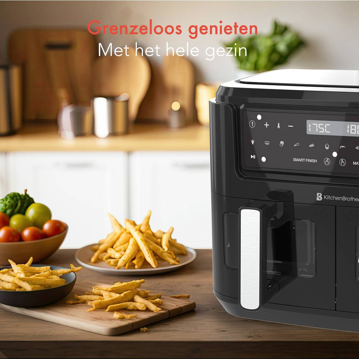 Air fryer with fries and other foods, with a person in the background, on a wooden counter.
