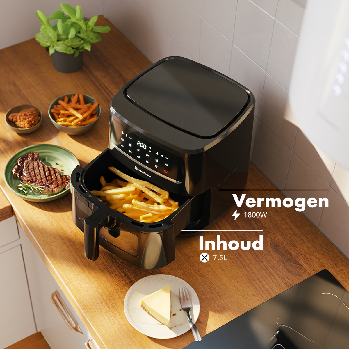 Black air fryer with fries inside, plus a piece of cake, steak and vegetables.
