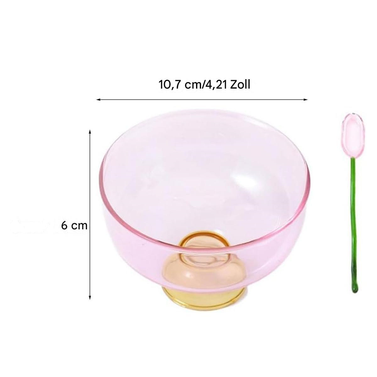 Rosa Glasschale mit rosa Löffel. Maße sind 10,7 cm x 6 cm. Der Löffel hat einen grünen Stiel.