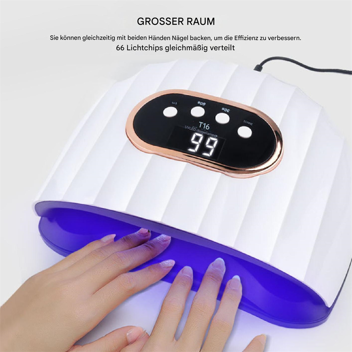 Hände in einem Nageltrockner. Weißes Gerät mit roségoldenen Details und einer Digitalanzeige mit 99.