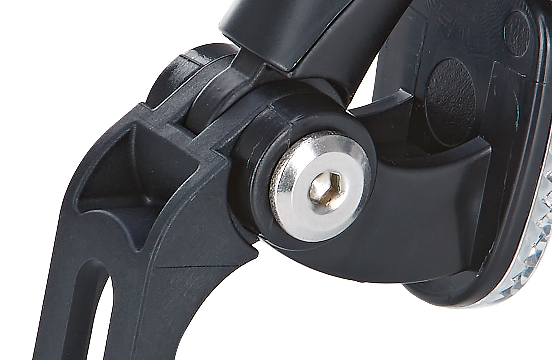 Nahaufnahme eines schwarzen Fahrradbremshebels. Eine silberne Schraube ist in der Mitte sichtbar.