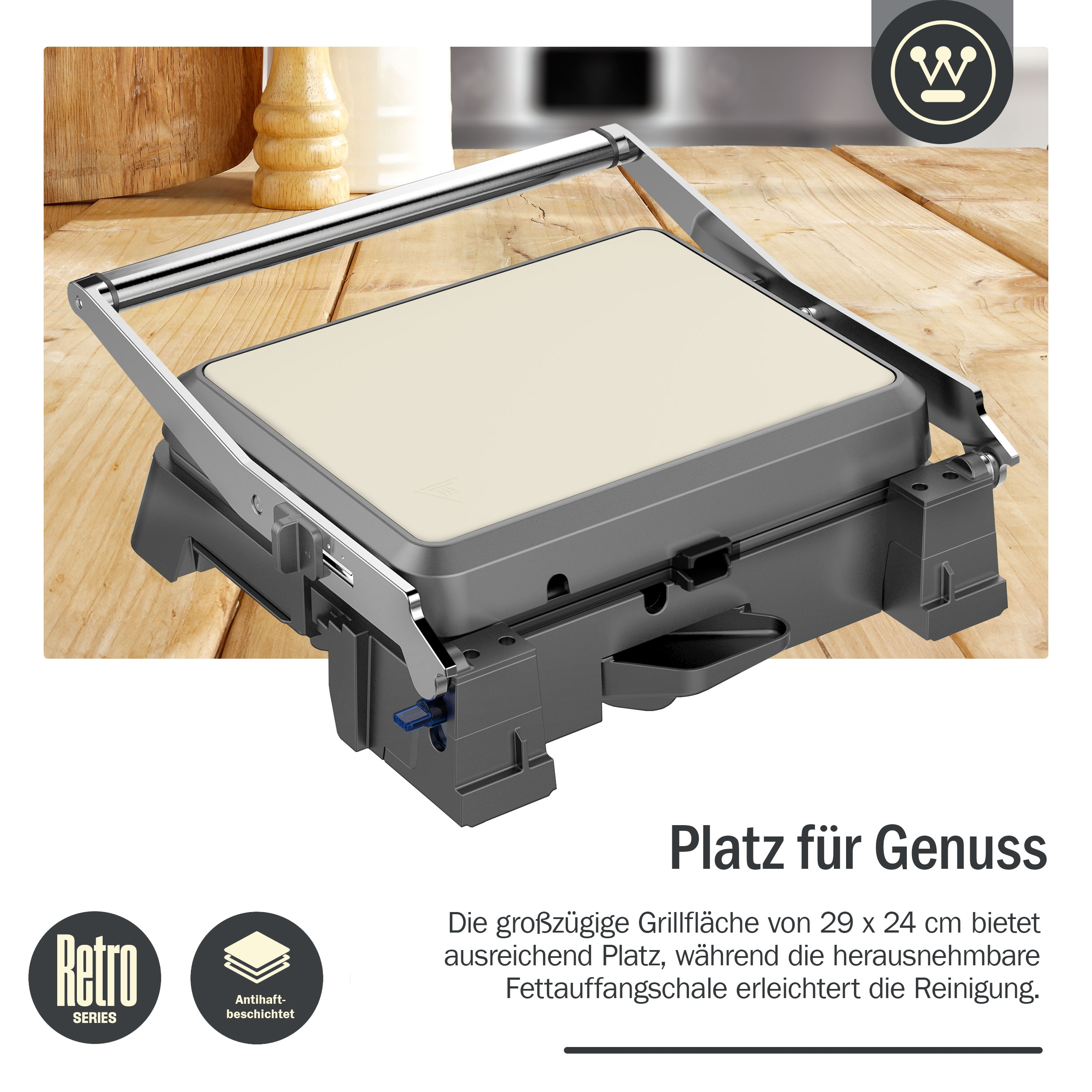 Ein grau-silberner Grill mit Antihaftbeschichtung und Griff. Text: 'Platz für Genuss'.