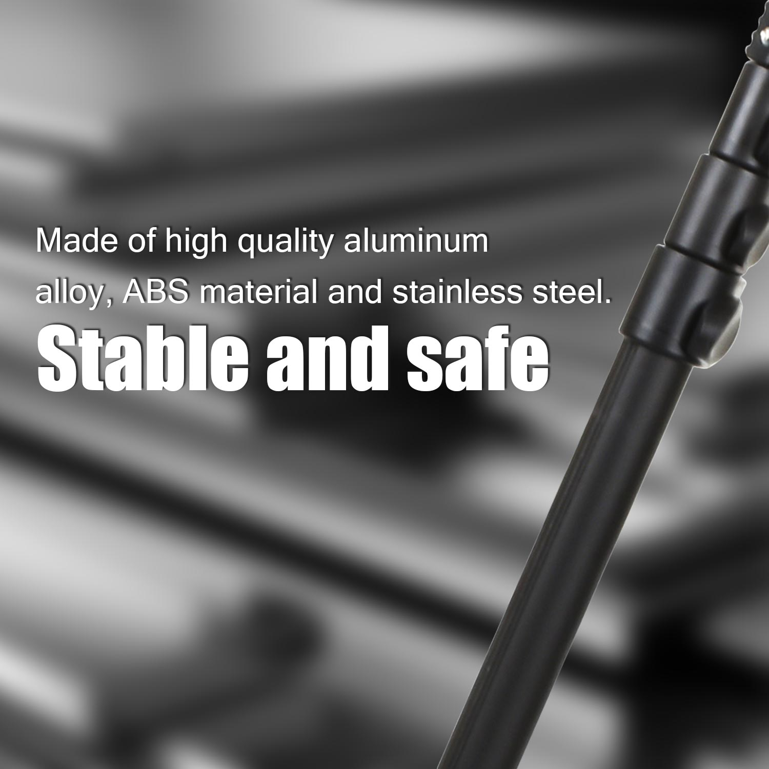 Czarny drążek pokazujący tekst: Wykonany z wysokiej jakości stopu aluminium, materiału ABS i stali nierdzewnej.