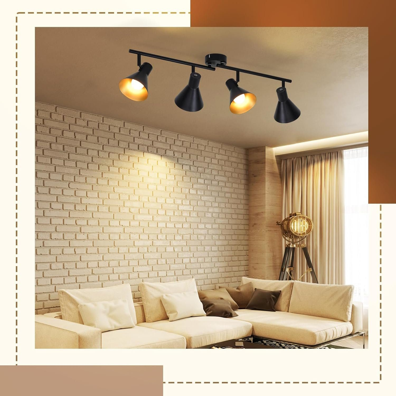 Czarne oświetlenie szynowe z czterema reflektorami. Kremowa sofa i ceglana ściana w tle.