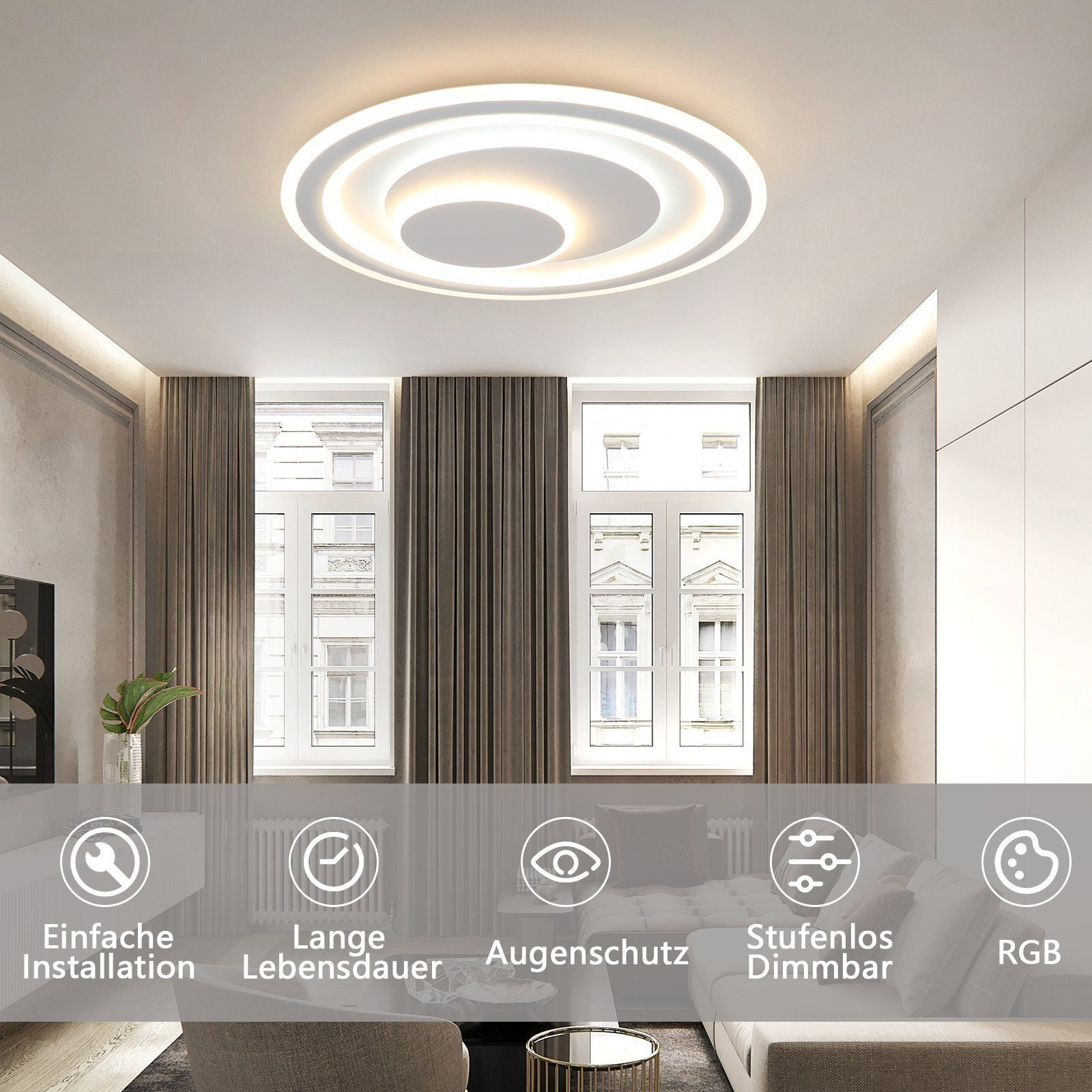 Biała lampa sufitowa o okrągłym kształcie. Wiele koncentrycznych okręgów światła na białym suficie.