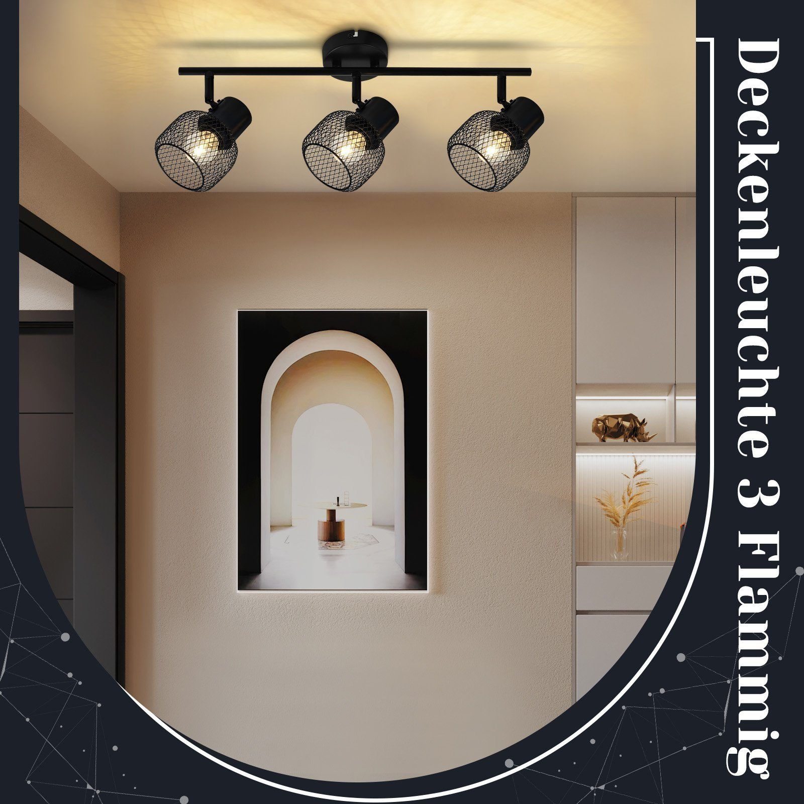 Lampy sufitowe nad pomieszczeniem z dziełami sztuki i meblami. Czarne reflektory z osłonami z siatki.
