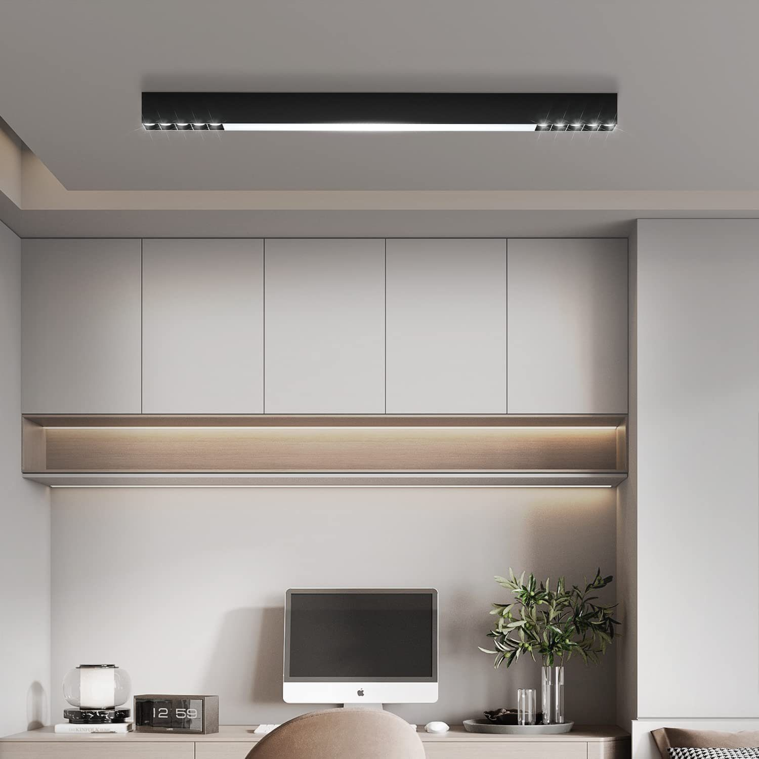 Długa czarna oprawa oświetleniowa LED zamontowana na suficie. Znajduje się w pokoju z białymi ścianami i biurkiem.