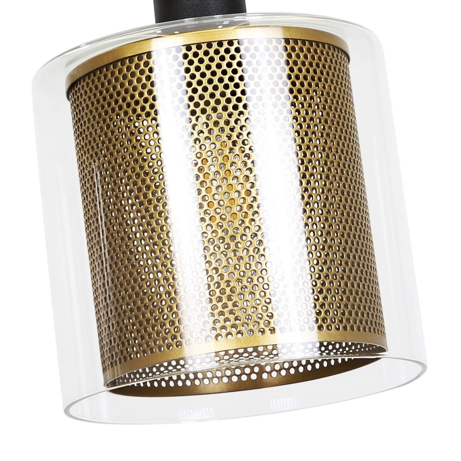 Zbliżenie mosiężnej lampy wiszącej ze szklaną obudową.