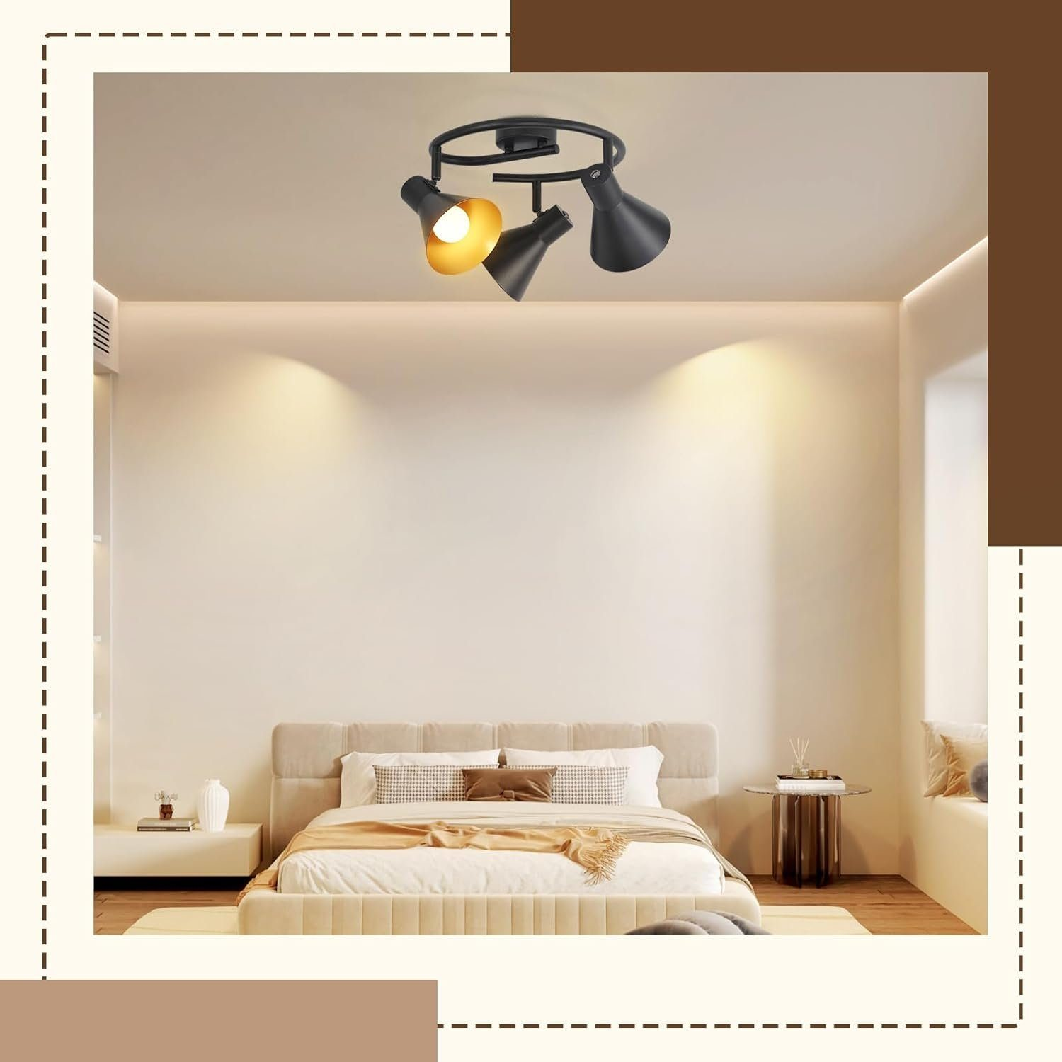 Schlafzimmer mit Bett, Deckenleuchten und cremefarbener Wand. Drei schwarze Strahler an der Decke.