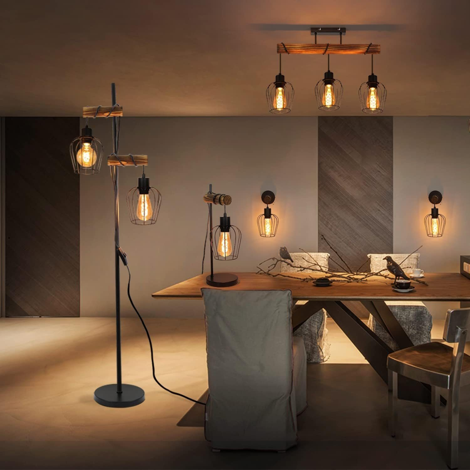 Ein Raum mit einer Stehlampe, einer Tischlampe und Pendelleuchten über einem Tisch.