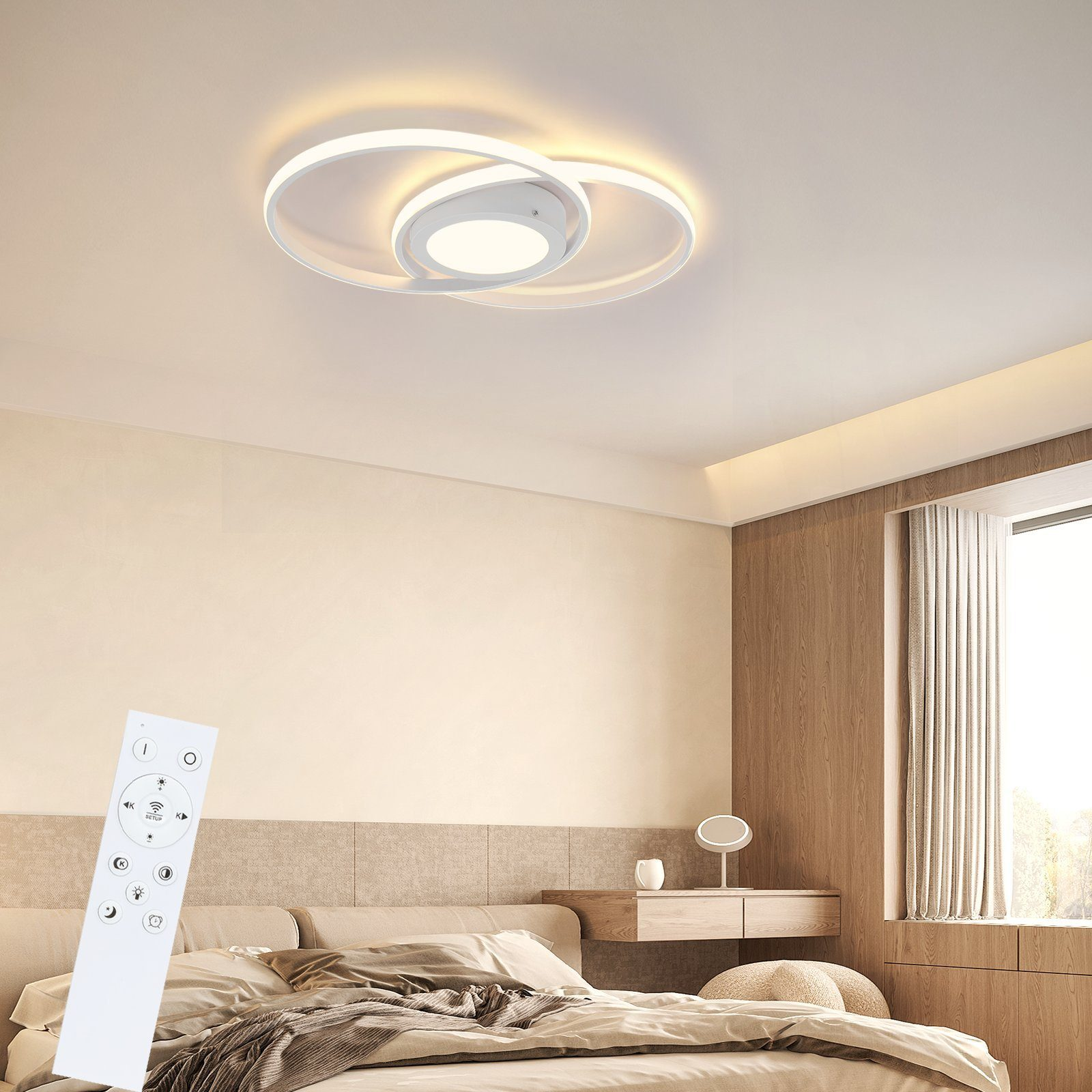Una lámpara de techo blanca con mando a distancia en un dormitorio, con una cama y una cómoda.