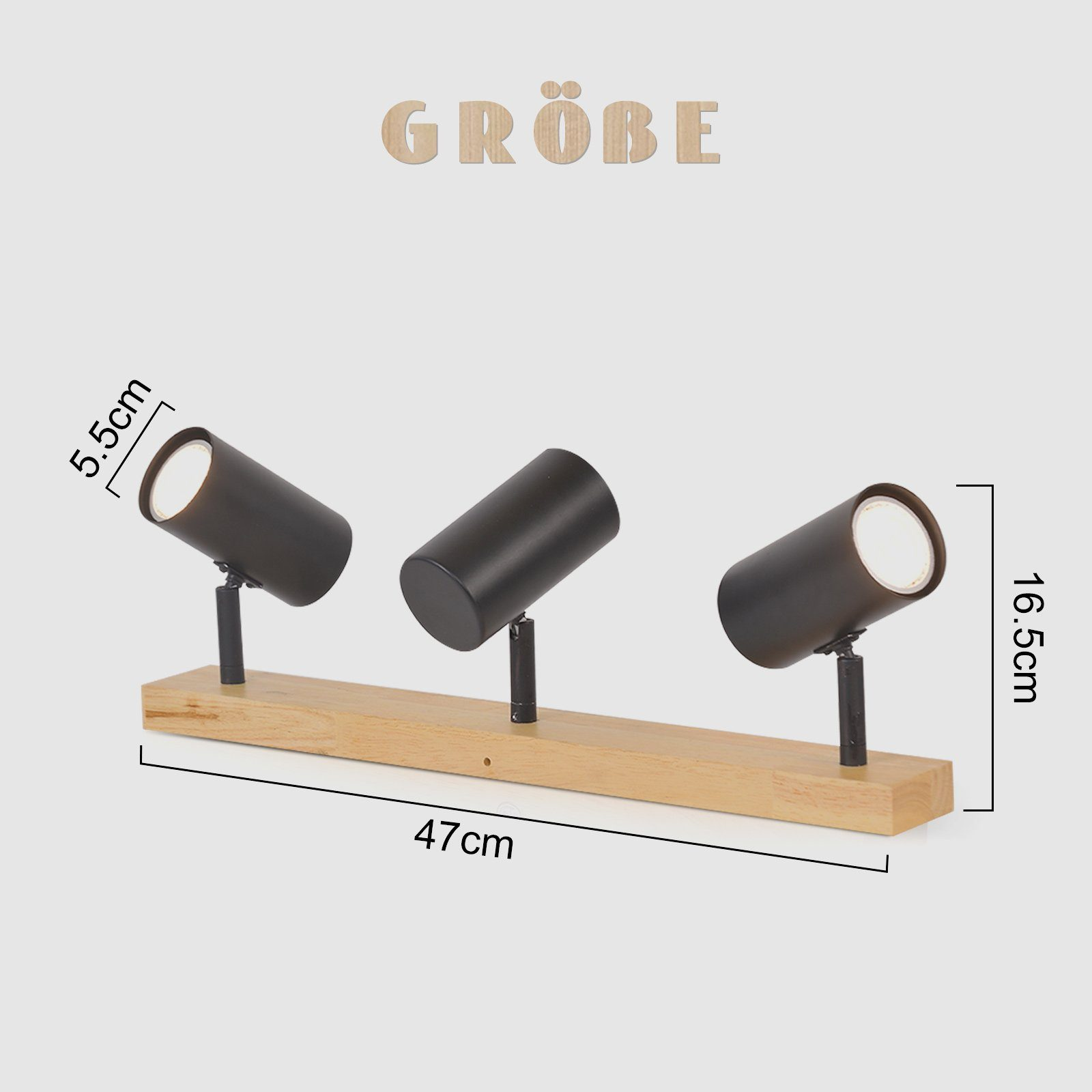 Tre faretti neri su una barra di legno. Le misure sono visualizzate. Sfondo bianco.