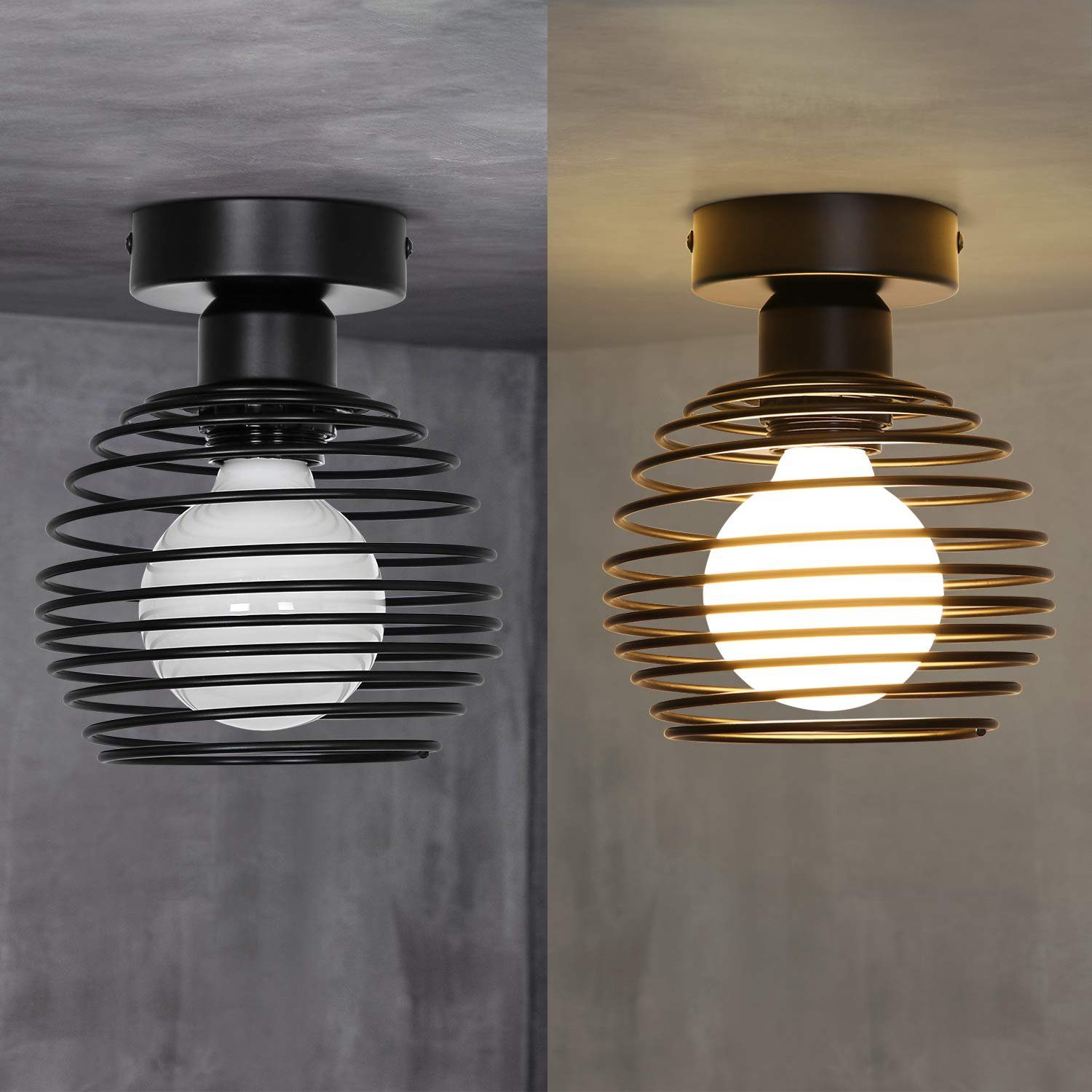 Oprawa oświetleniowa z czarnym, spiralnym wzorem. Pokazano dwie opcje żarówek.