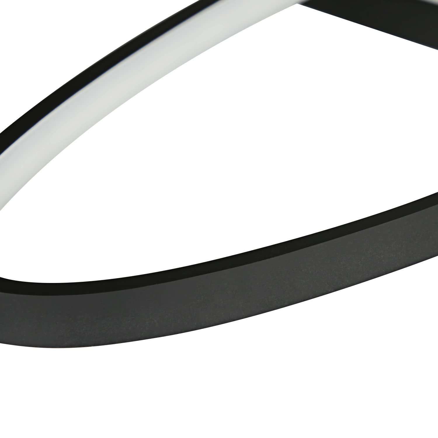 Primo piano di un'apparecchio di illuminazione in bianco e nero. Cornice nera con luce bianca, design semplice.