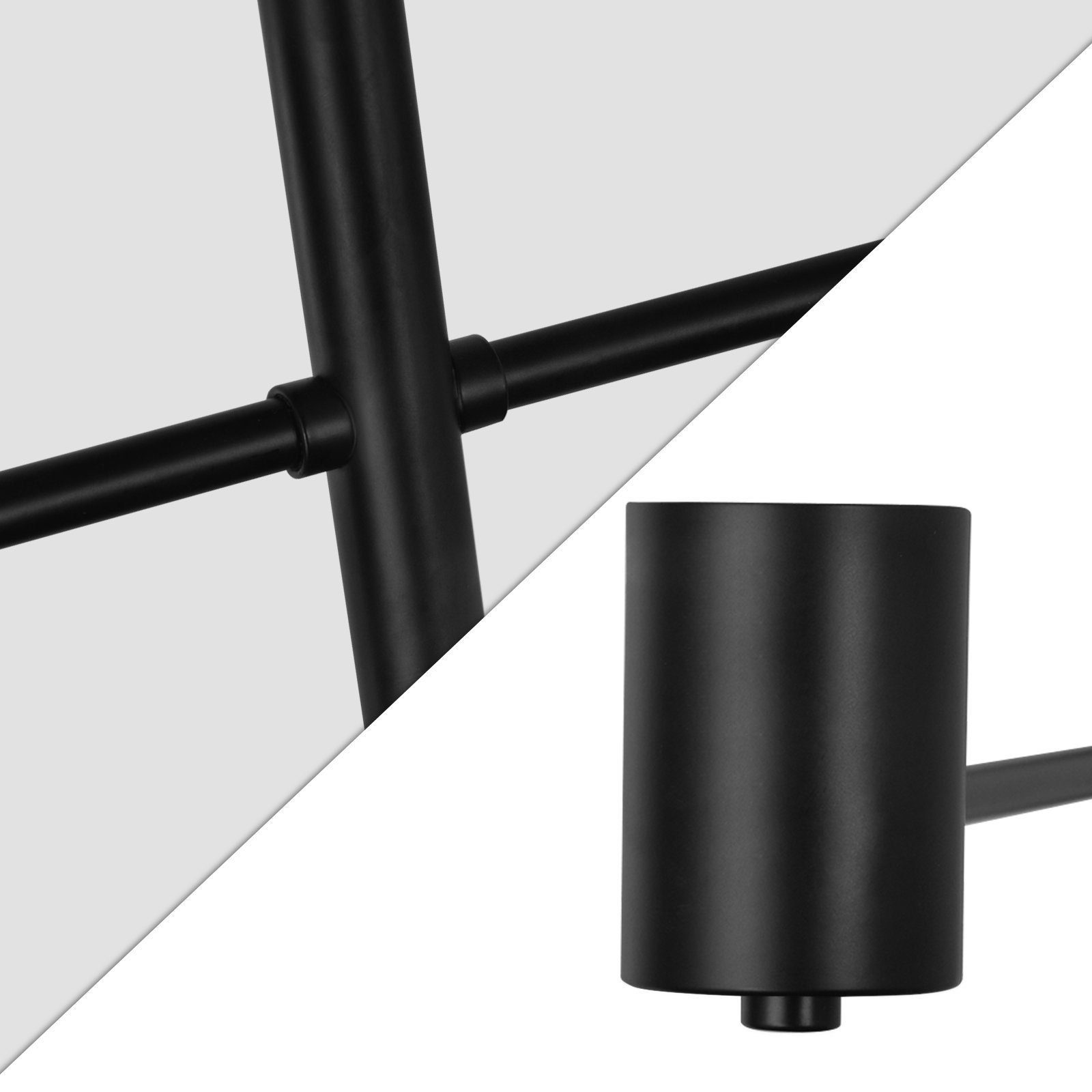 Dwa czarne kinkiety emitujące światło. Telefon pokazuje światła, a za nimi regał z książkami.