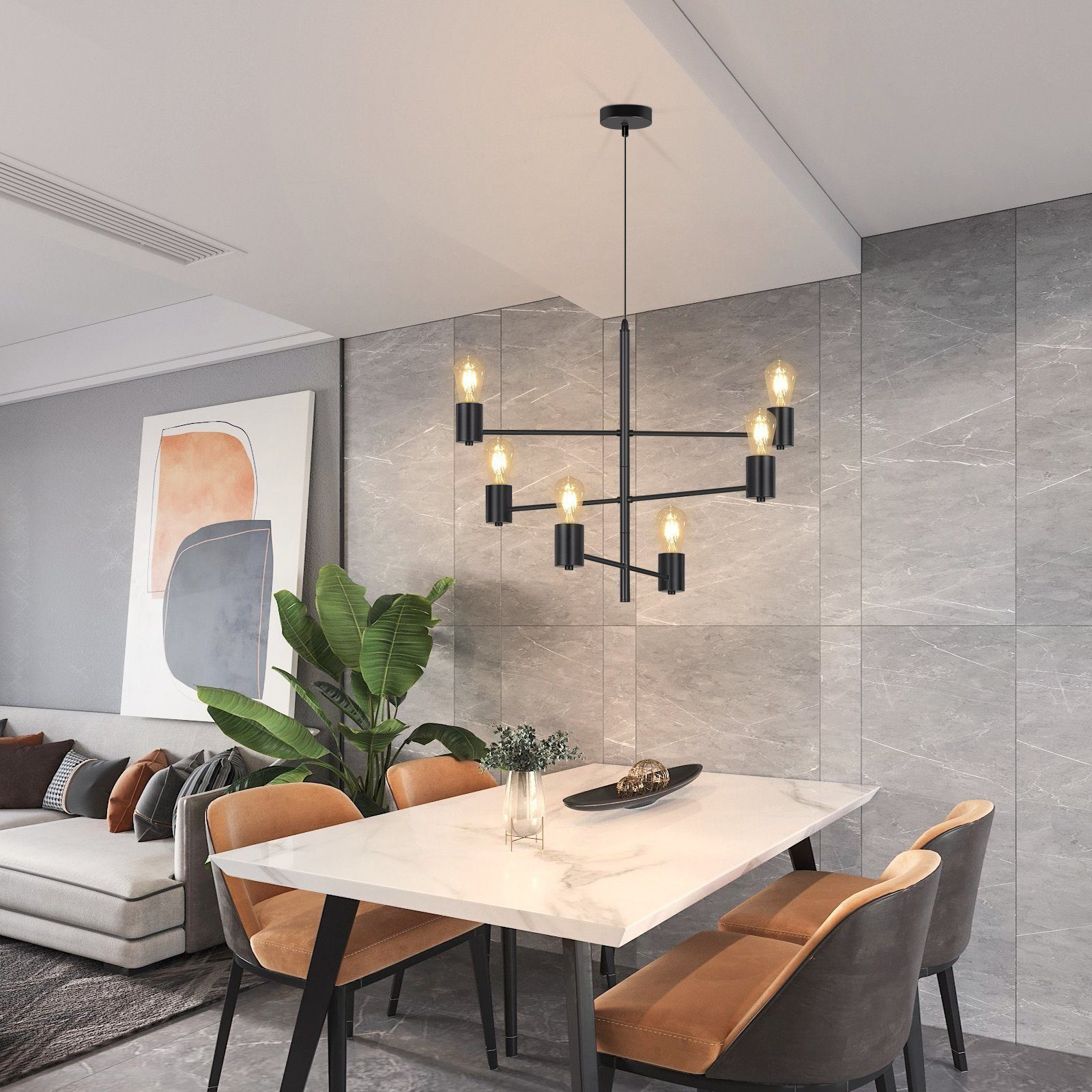 Wiszący żyrandol z 8 żarówkami nad stołem z krzesłami. Szara ściana, biały sufit. Nowoczesne wnętrze.