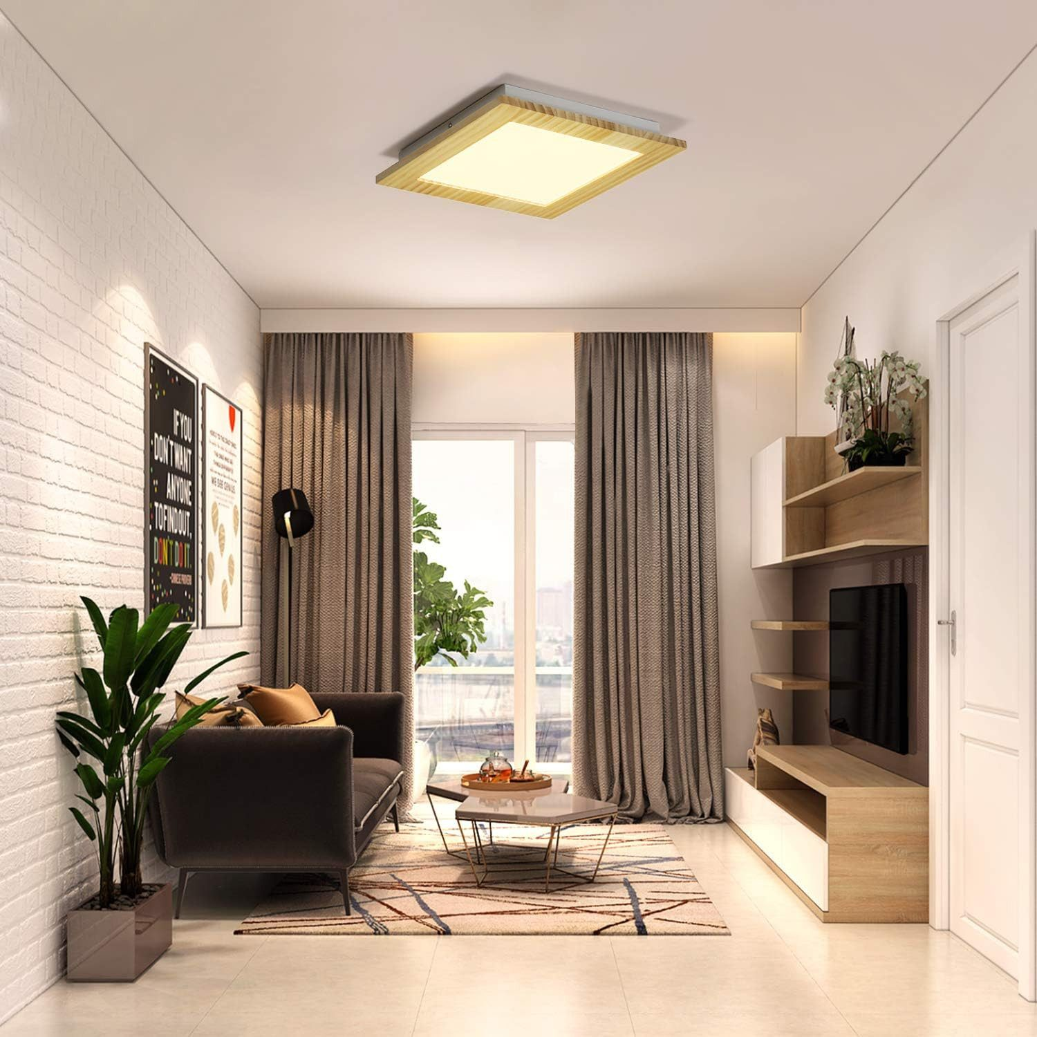 Jasny pokój z kwadratową drewnianą lampą sufitową, szarą sofą i białą ceglaną ścianą.