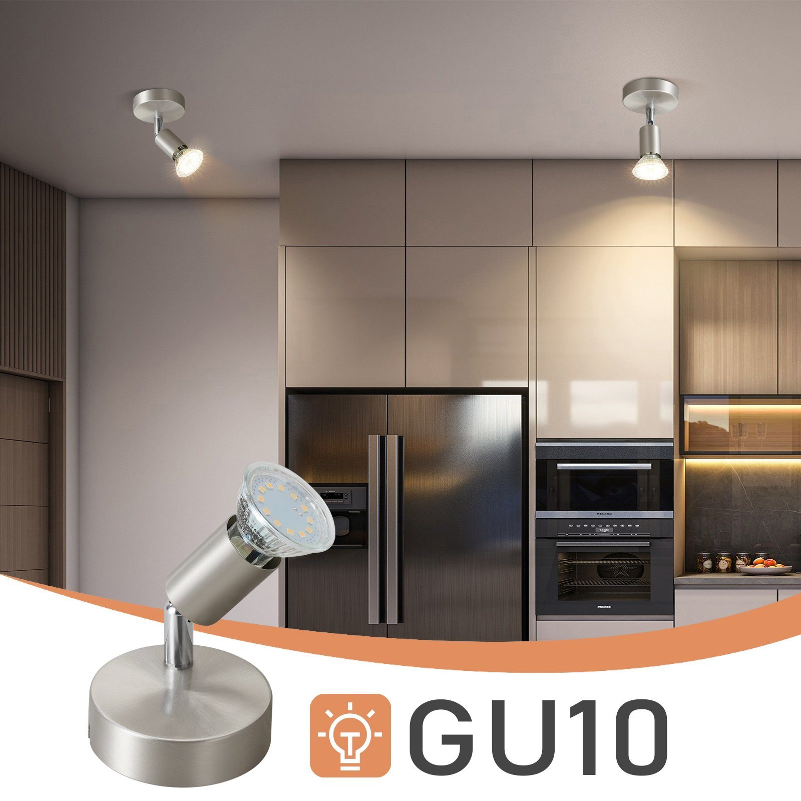 Srebrny reflektor GU10 w kuchni, z szafkami i lodówką w tle.