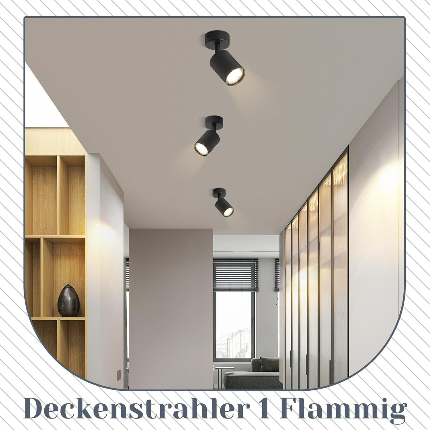 Drei schwarze Strahler an einer weißen Decke in einem Flur. Die Lichter zeigen nach unten.