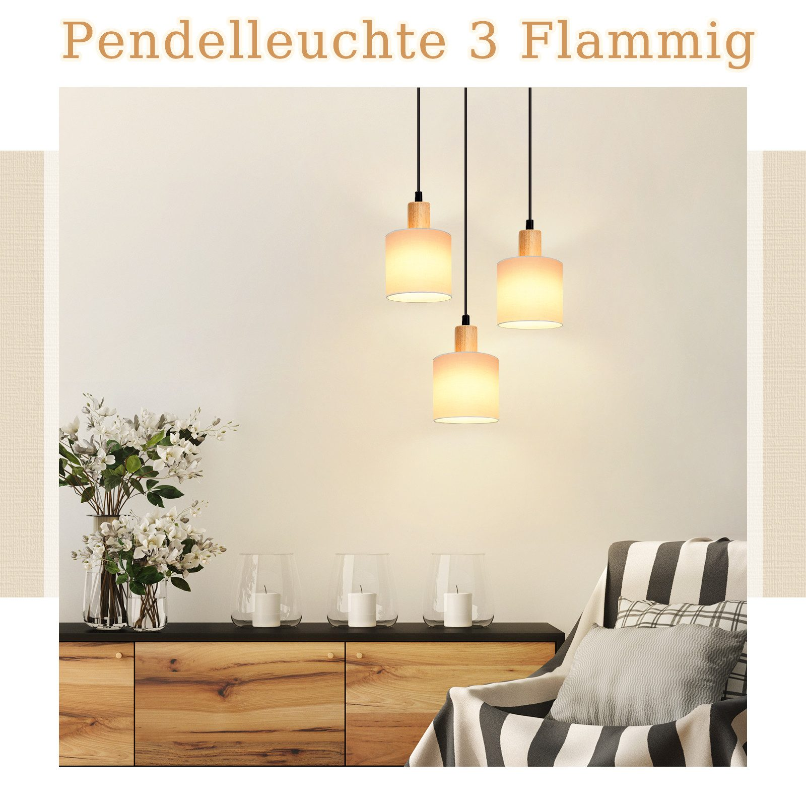 Drei Pendelleuchten mit zylindrischen Schirmen. An einer Wand mit Kunst und einer Couch mit gestreiften Kissen.