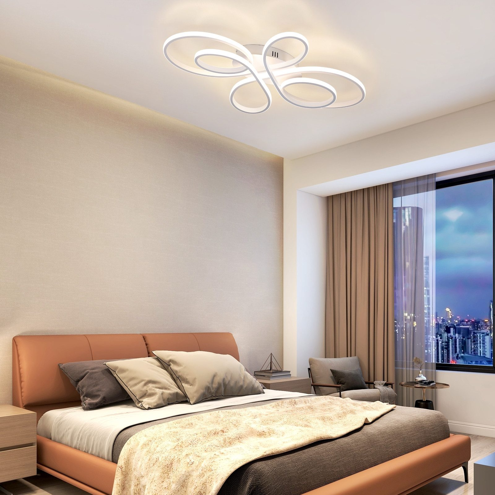 Una camera da letto moderna con un letto, tende marroni e un lampadario unico.