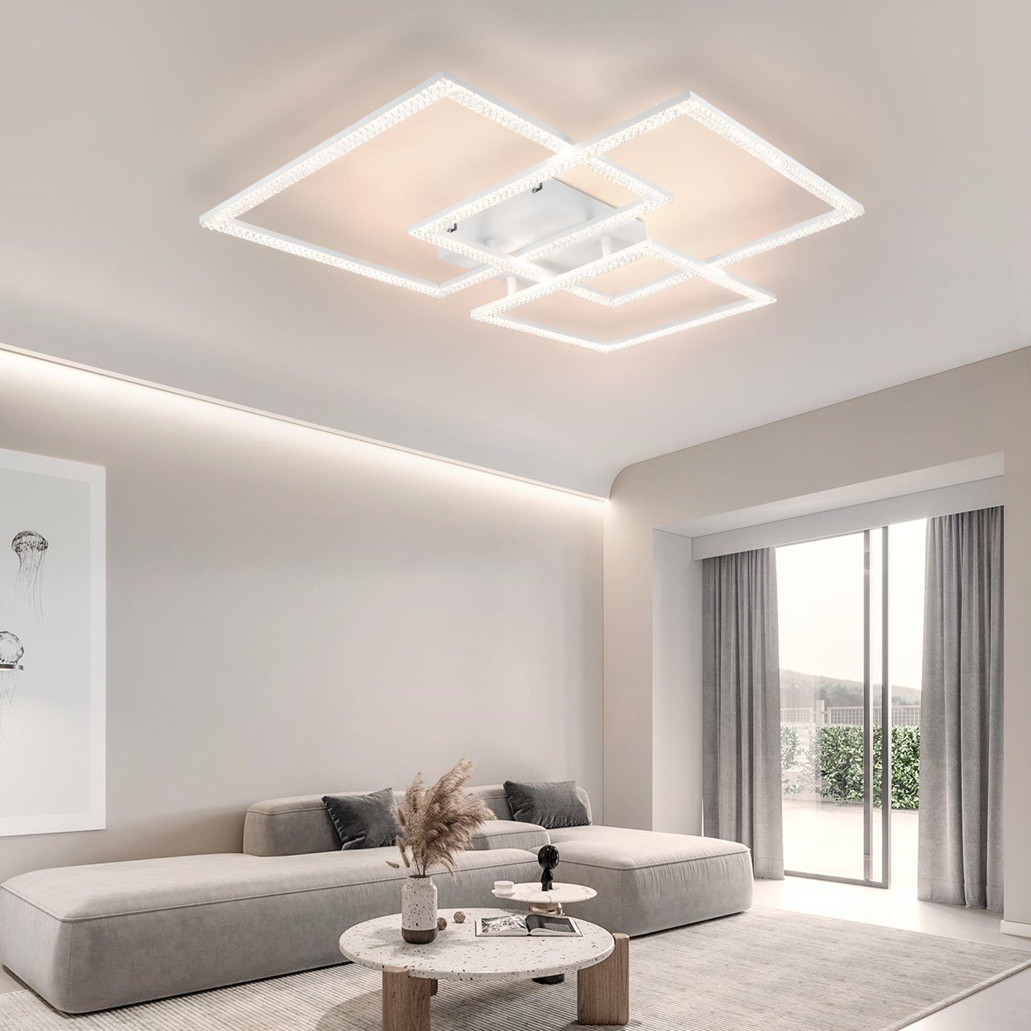 Soggiorno moderno con un lampadario geometrico.