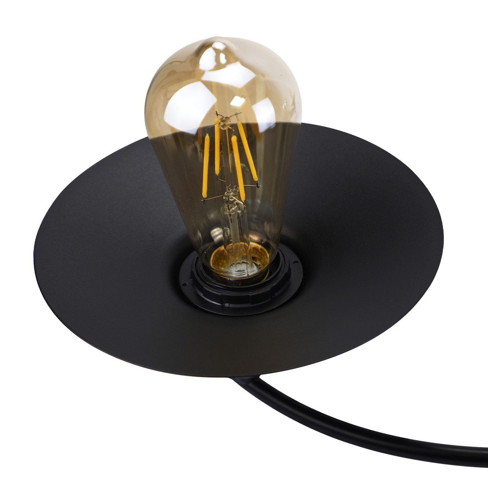 Una lampada nera con una lampadina. La lampadina ha filamenti gialli e vetro trasparente.
