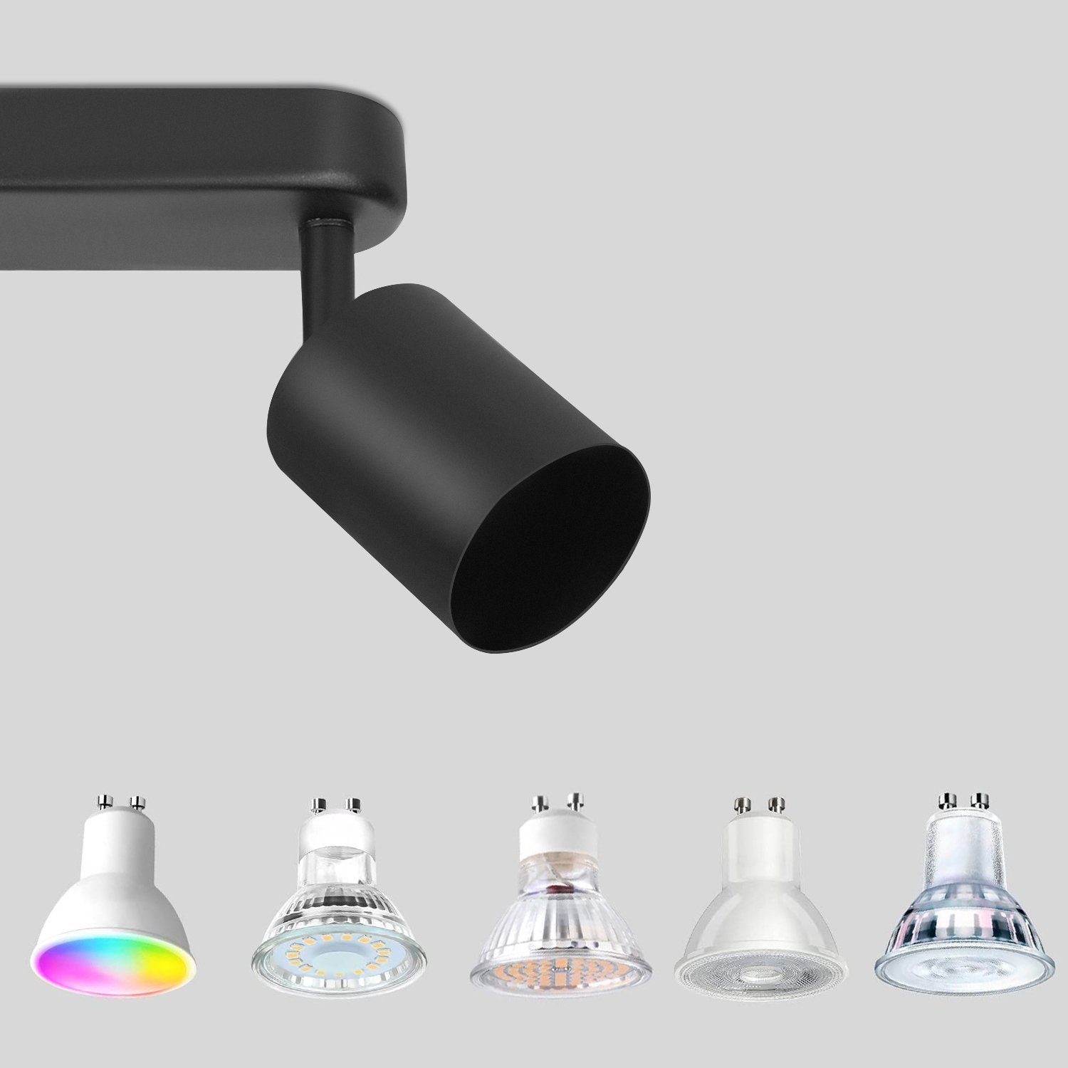 Un faretto nero con diverse opzioni di lampadine. Sfondo bianco.