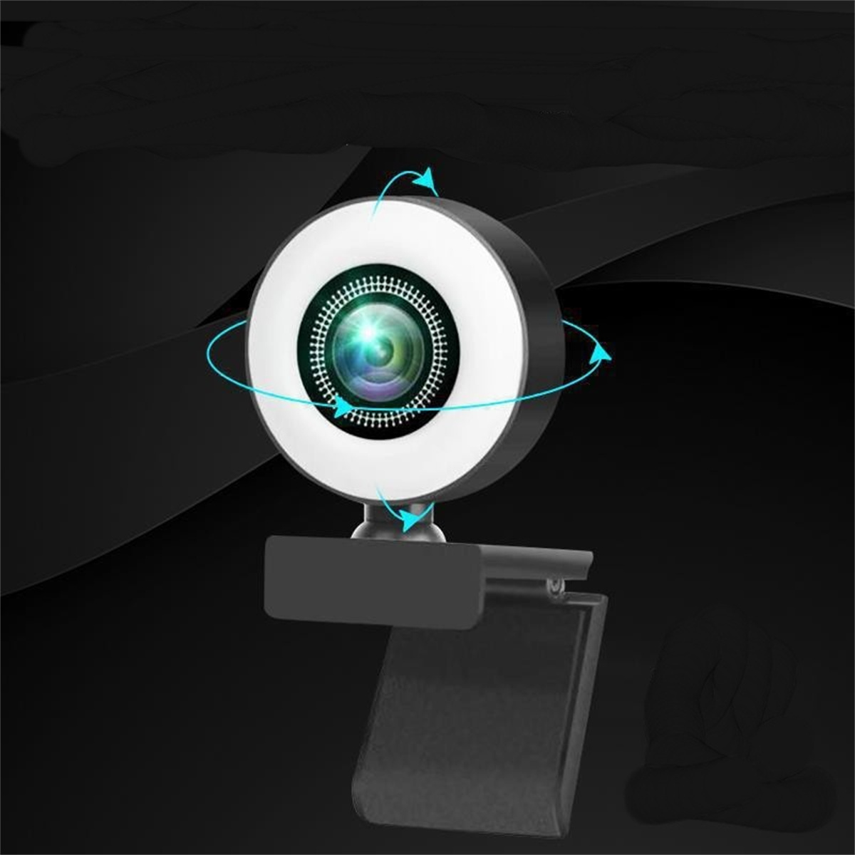 Webcam mit Ringlicht und schwarzem Clip auf dunklem Hintergrund. Blaue Pfeile zeigen die Drehung an.