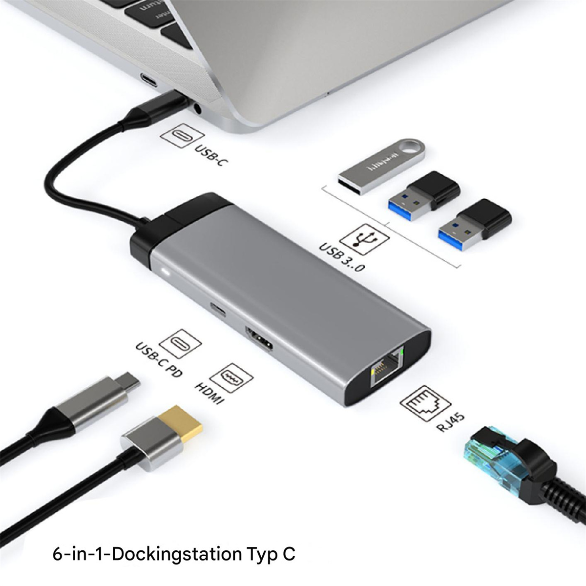 Eine silberne Dockingstation mit verschiedenen Anschlüssen, die mit einem Laptop und externen Geräten verbunden sind.