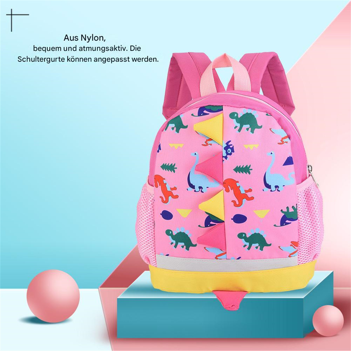 Rosa Dinosaurier-Rucksack auf blauem Hintergrund. Er hat rosa Netztaschen und einen gelben Boden.